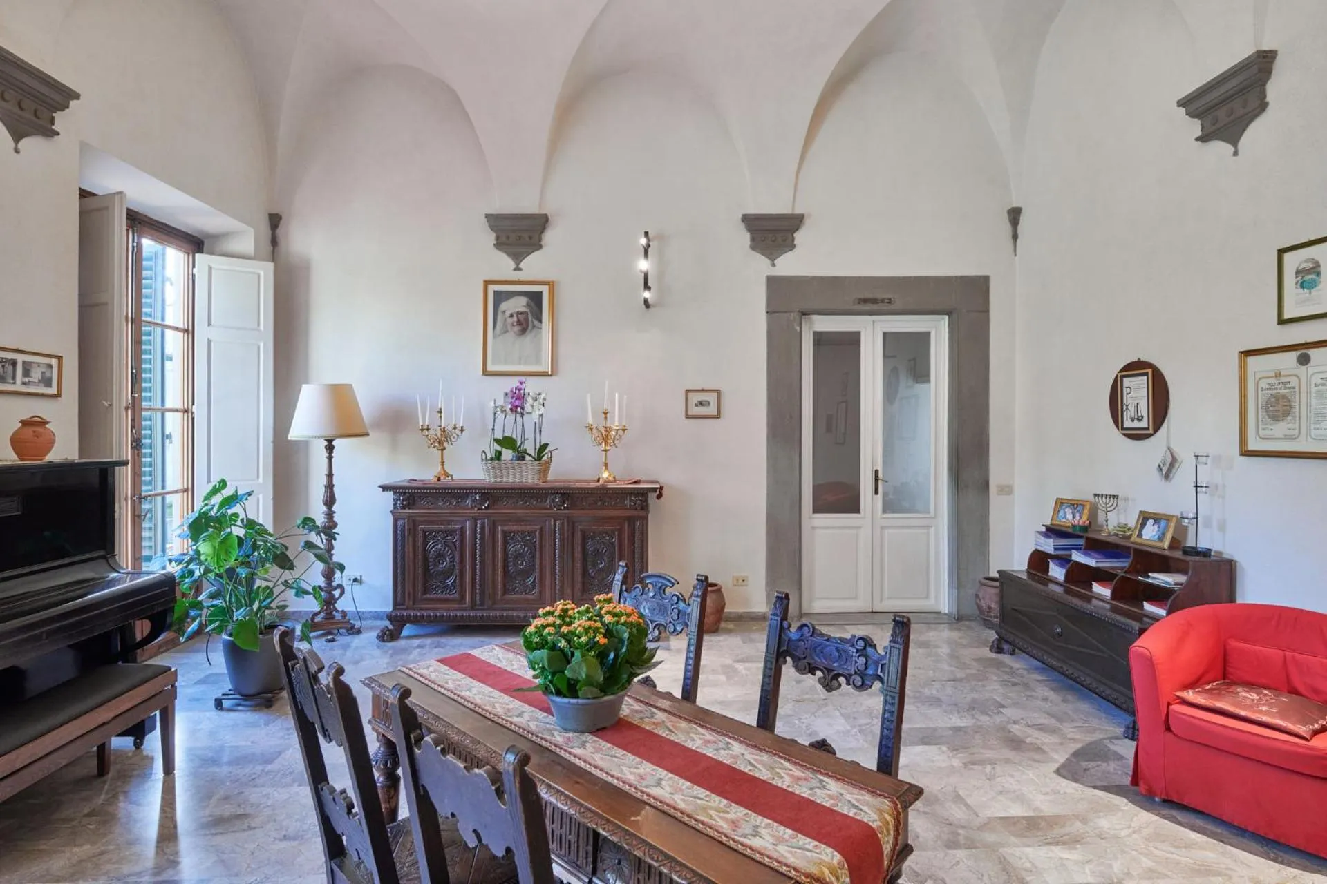 Communal lounge/ TV room in Casa Santo Nome di Gesu