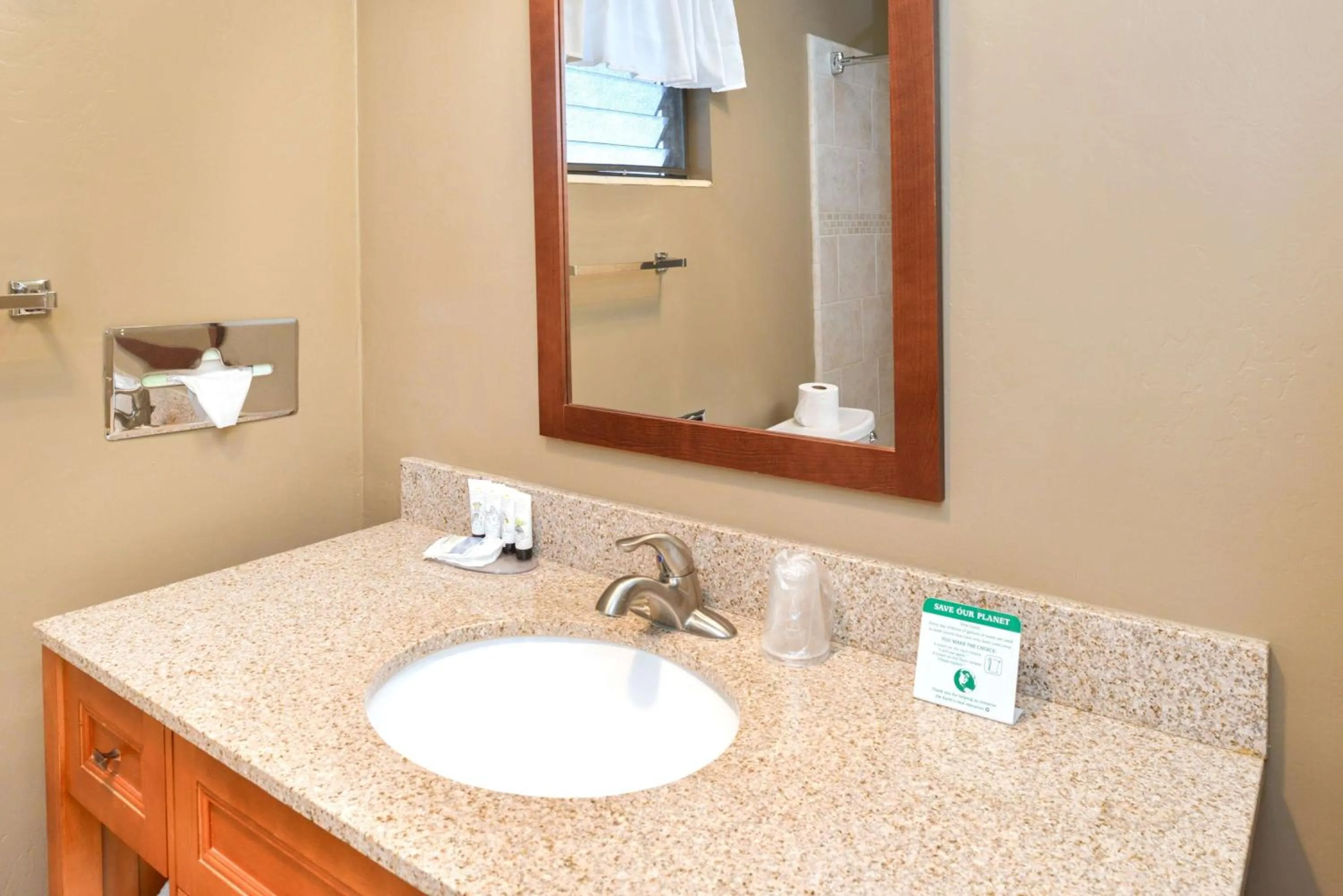Bathroom in Svendsgaard's Lodge- Americas Best Value Inn & Suites