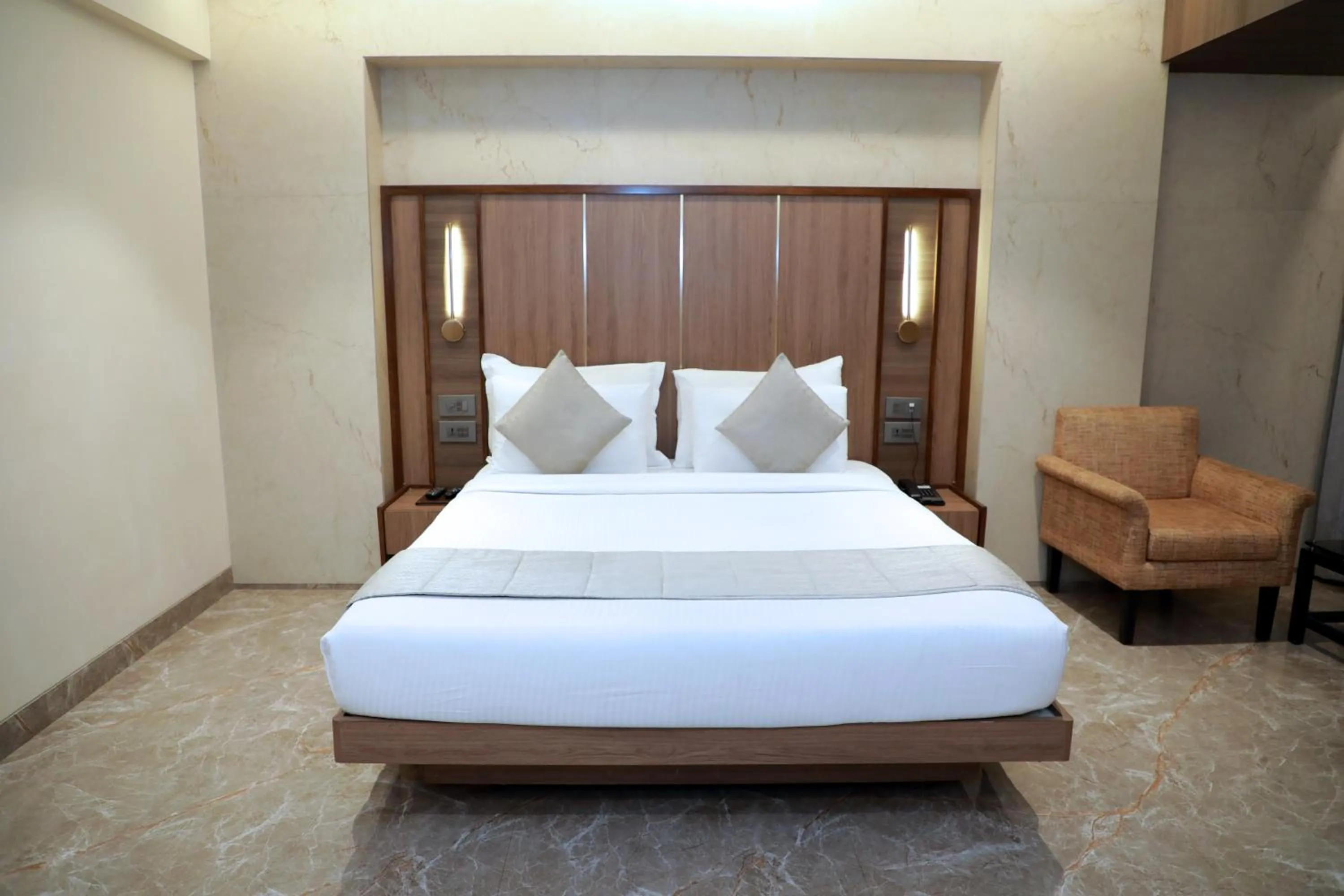 Bedroom in HOTEL ARCHANA RESIDENCY