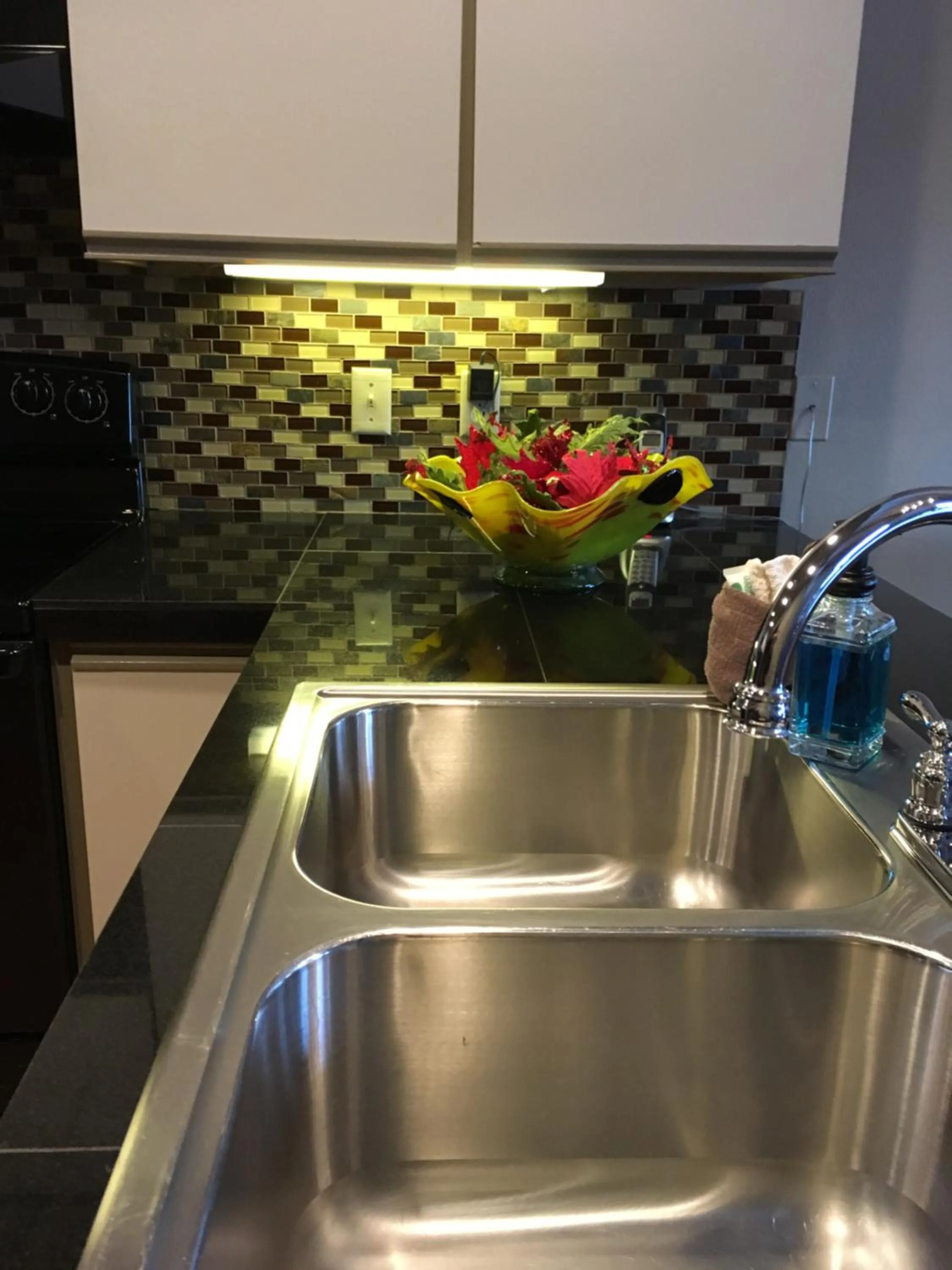 Kitchen or kitchenette in Der Sportsmann Suites