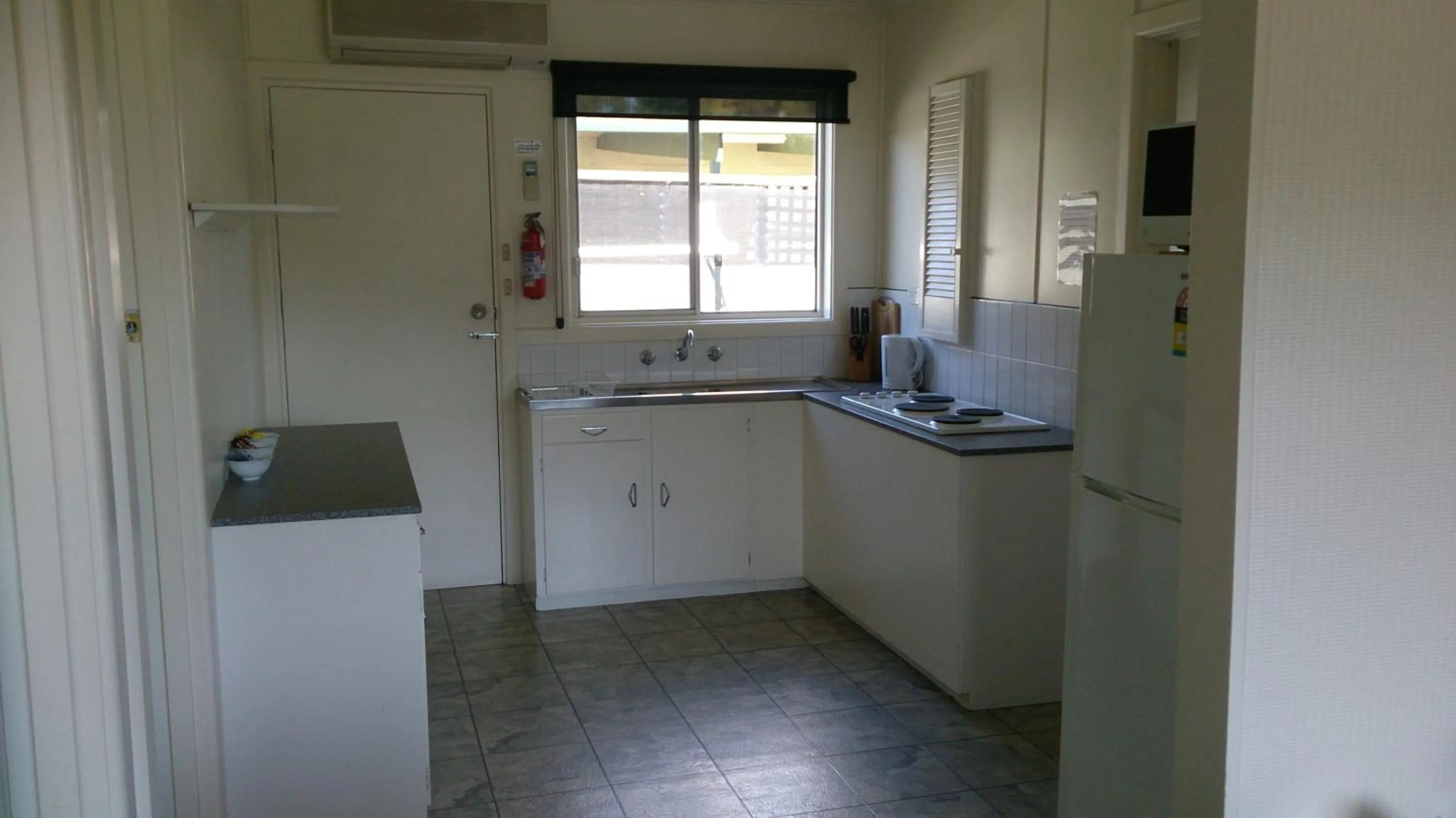 Kitchen or kitchenette in Phillip Island Cottages