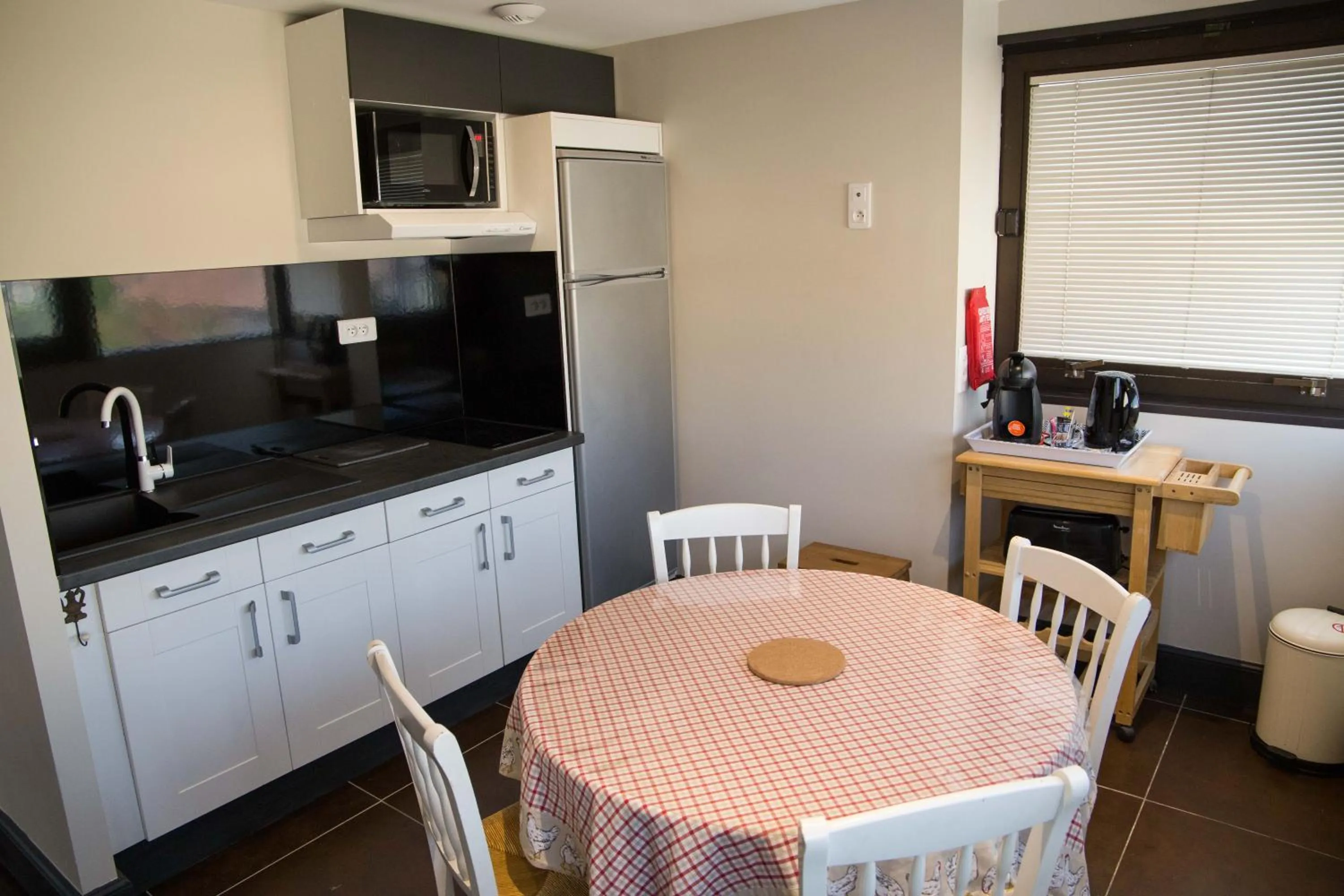 Kitchen or kitchenette in Appart-hôtel Chanzy / Angoulême