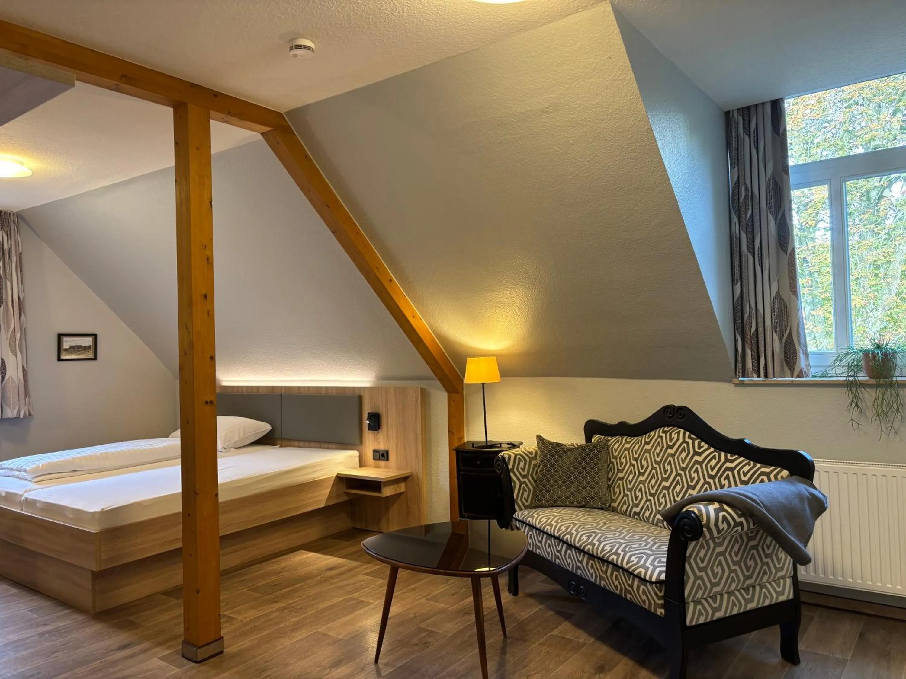 Photo of the whole room, Bed in Heitmann`s Gasthof