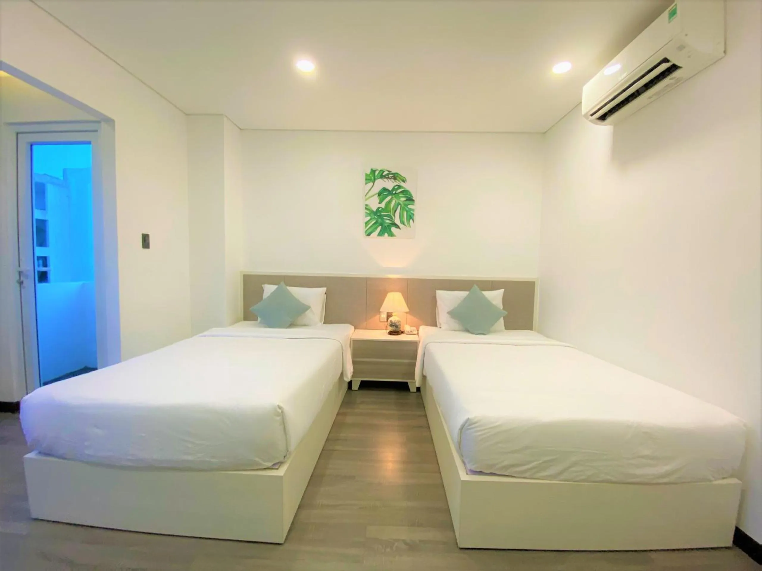 Bed in Olivia Hotel and Apartment