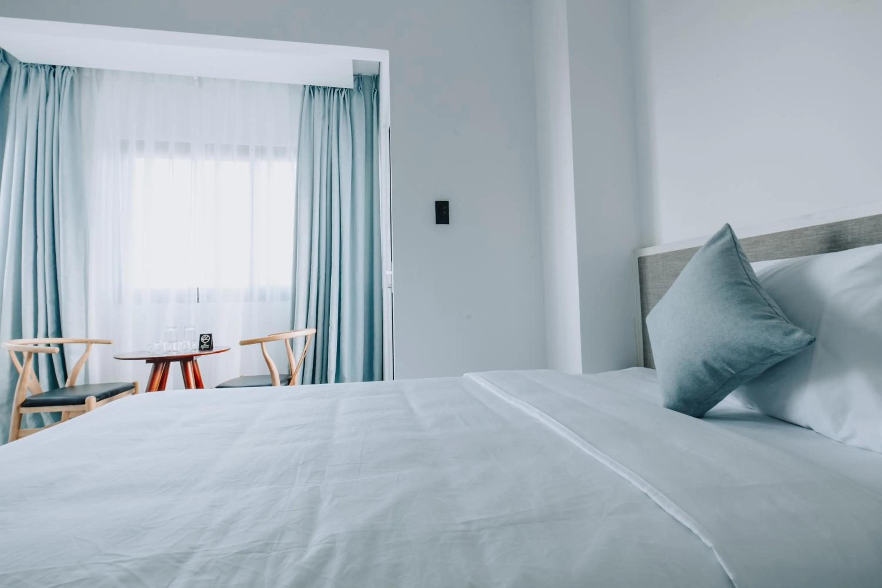 Bed in Olivia Hotel and Apartment