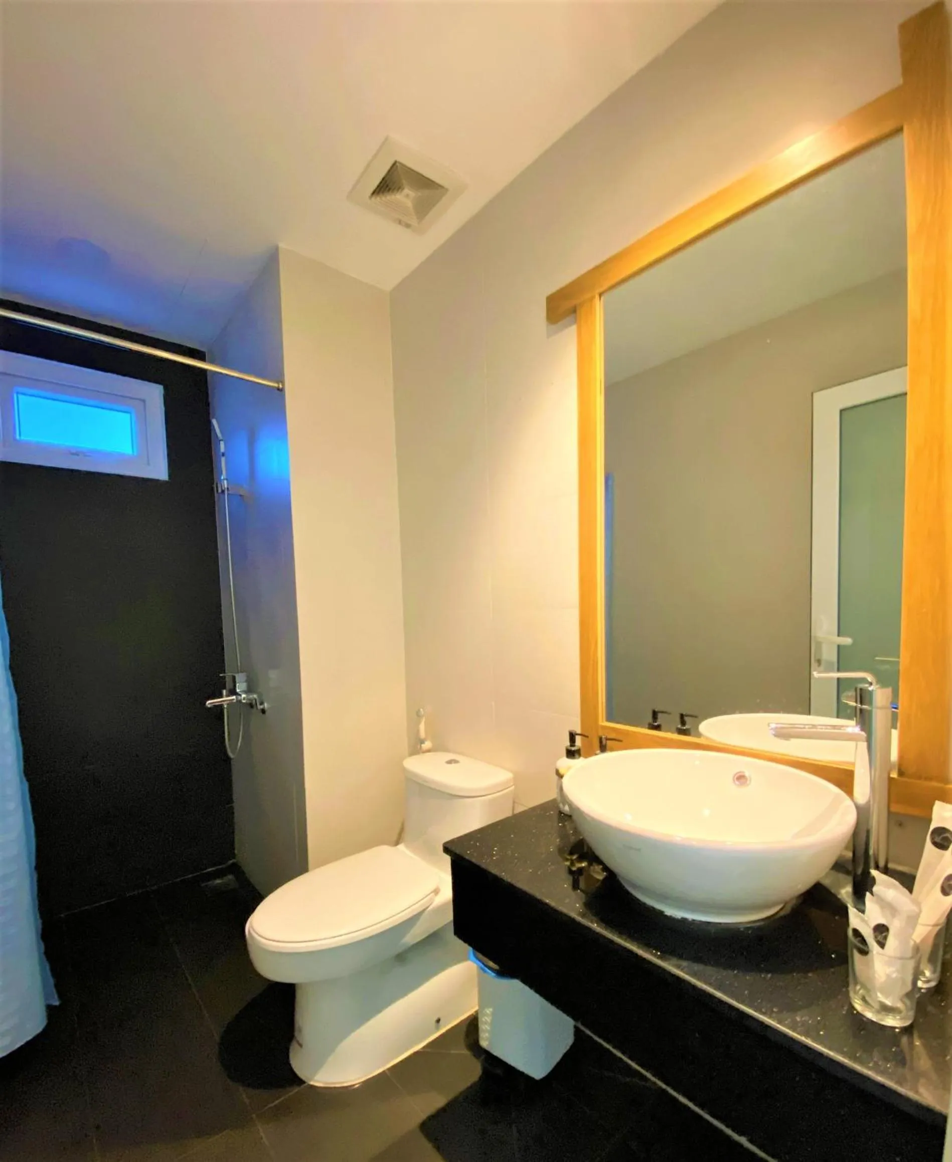 Bathroom in Olivia Hotel and Apartment
