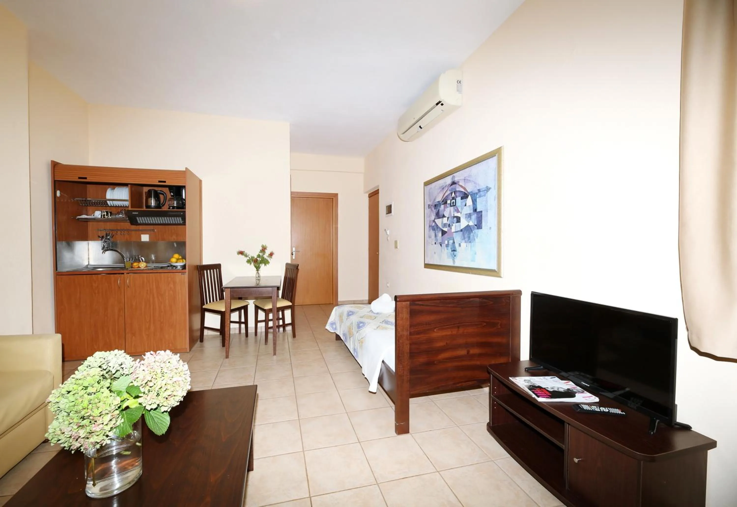 Bedroom in Palirria Hotel & Studios