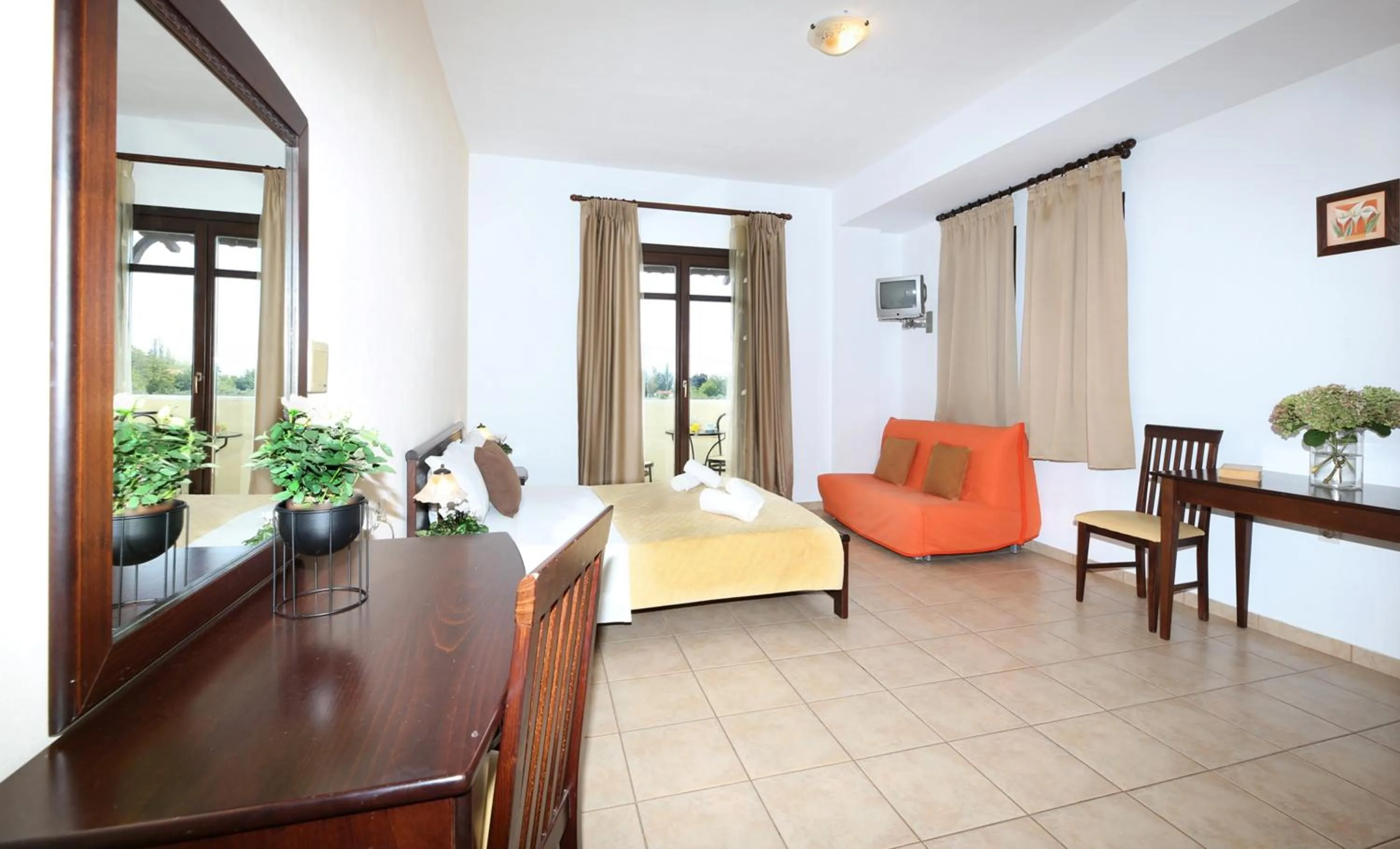 Bedroom in Palirria Hotel & Studios