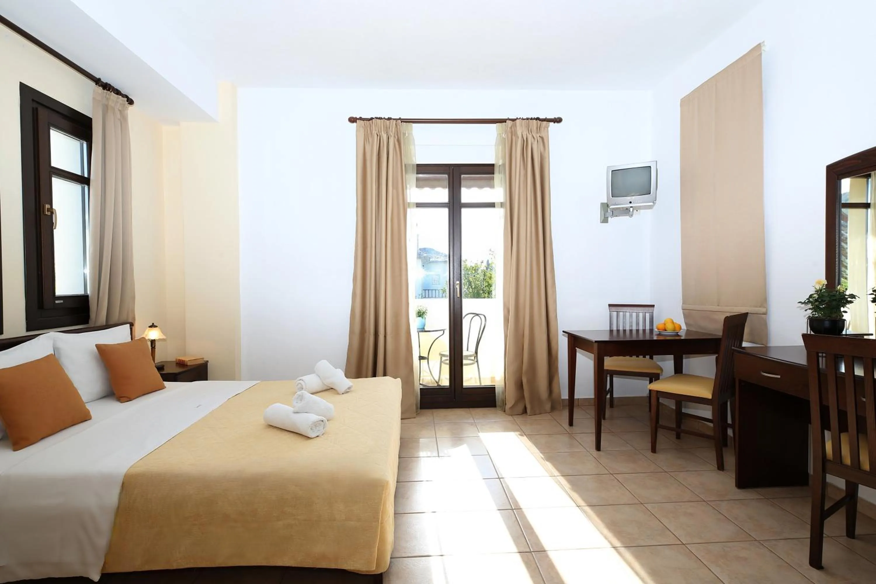 Balcony/Terrace, Bed in Palirria Hotel & Studios