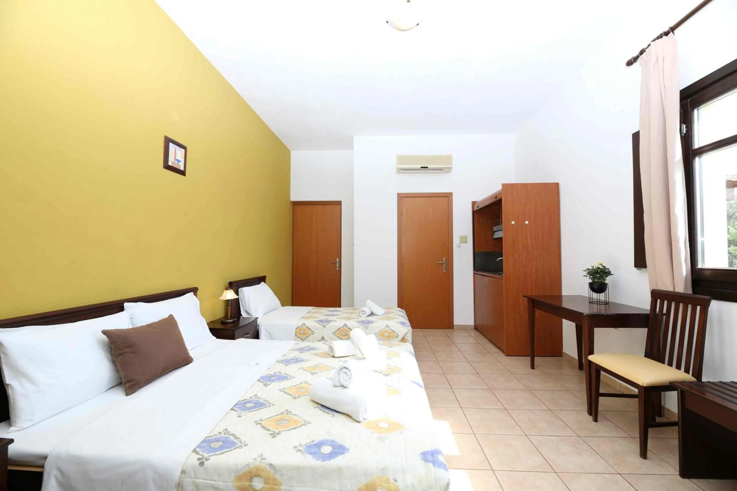 Bed in Palirria Hotel & Studios