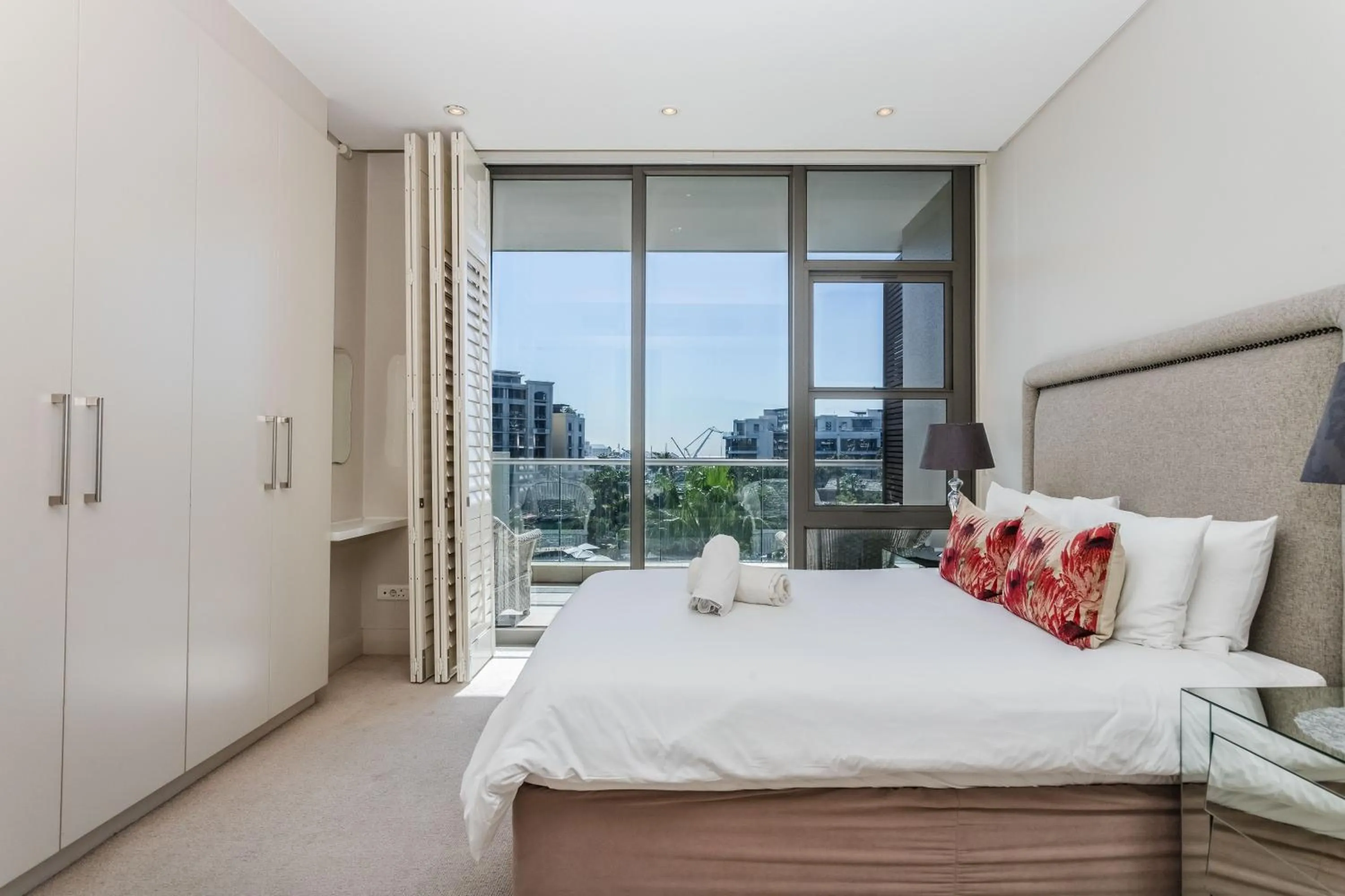 Bed in Mountain Marina Luxury Apartments