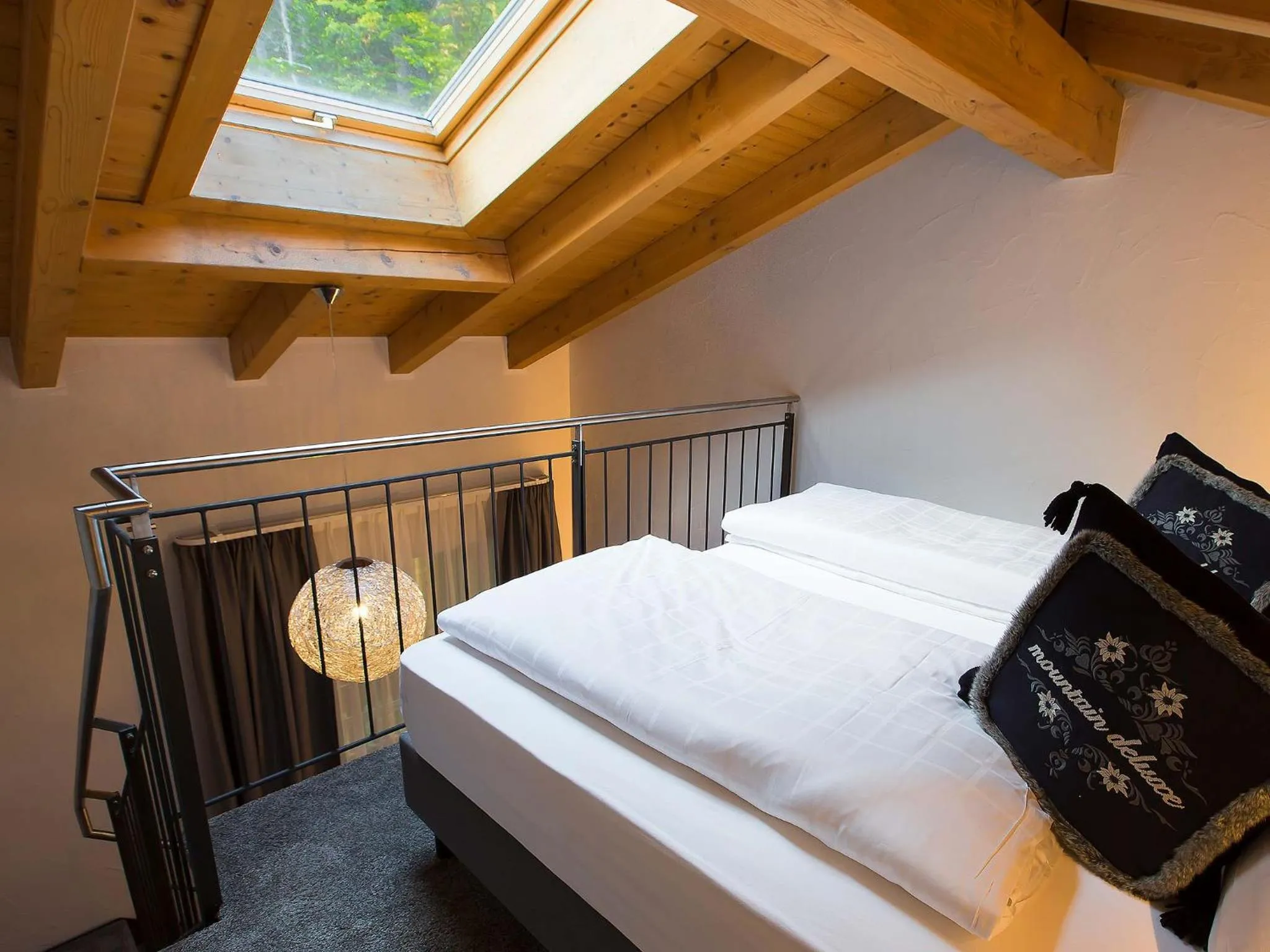Photo of the whole room, Bed in Elements Hotel Christlessee