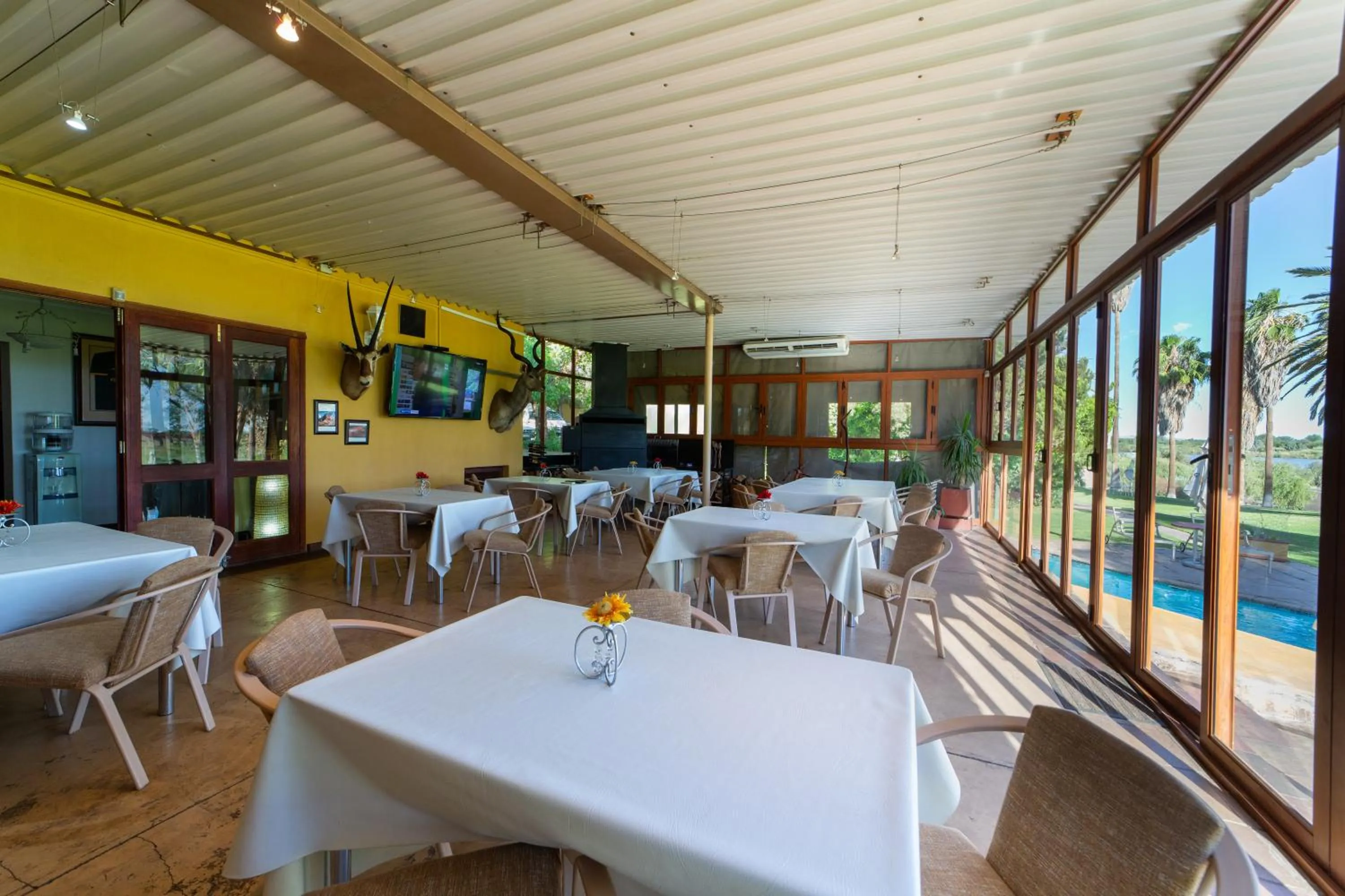 Communal lounge/ TV room in Sunriver Kalahari Lodge Riverside stay in Upington