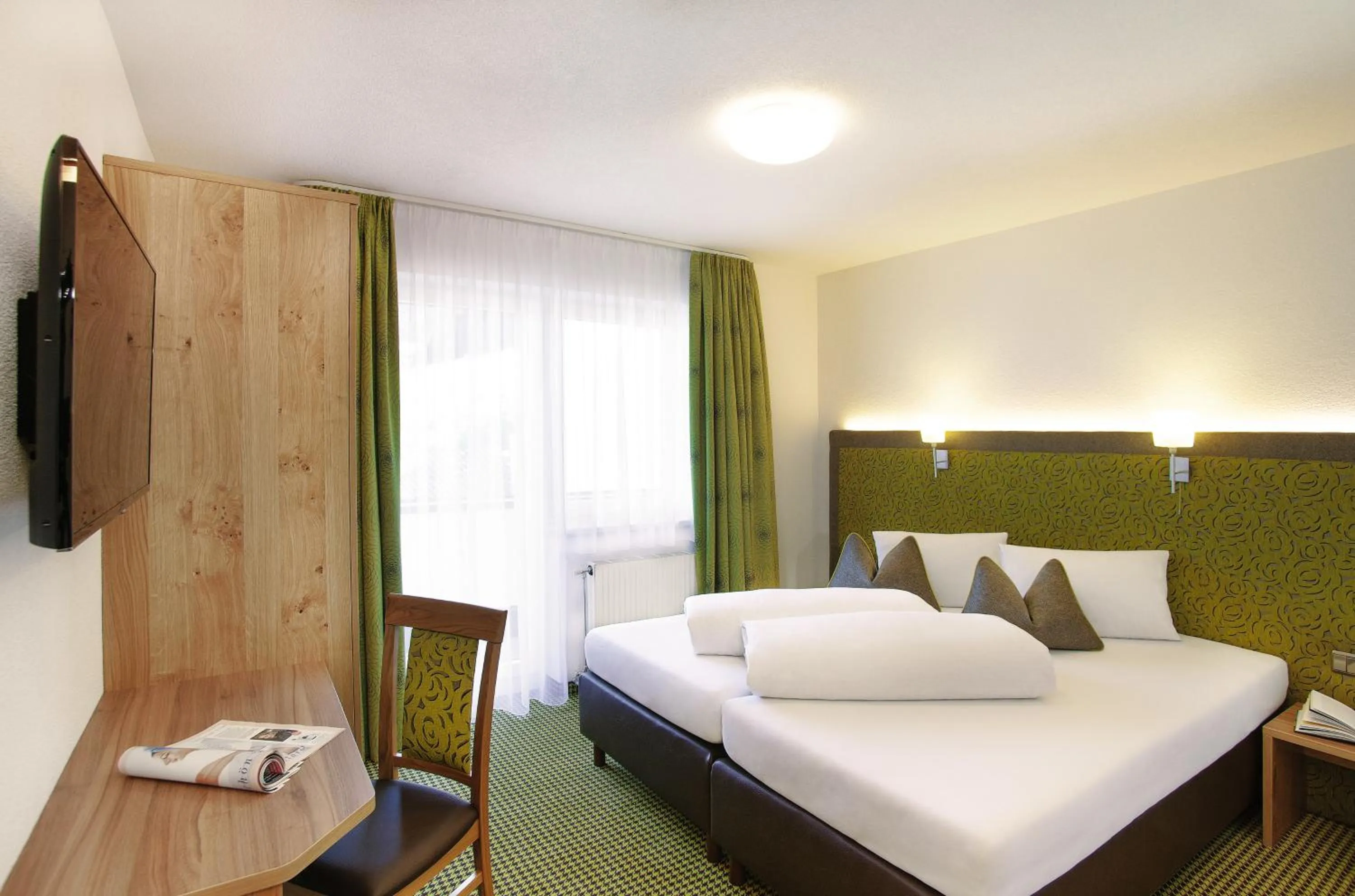 Bedroom, Bed in Hotel Garni Chasa Sulai
