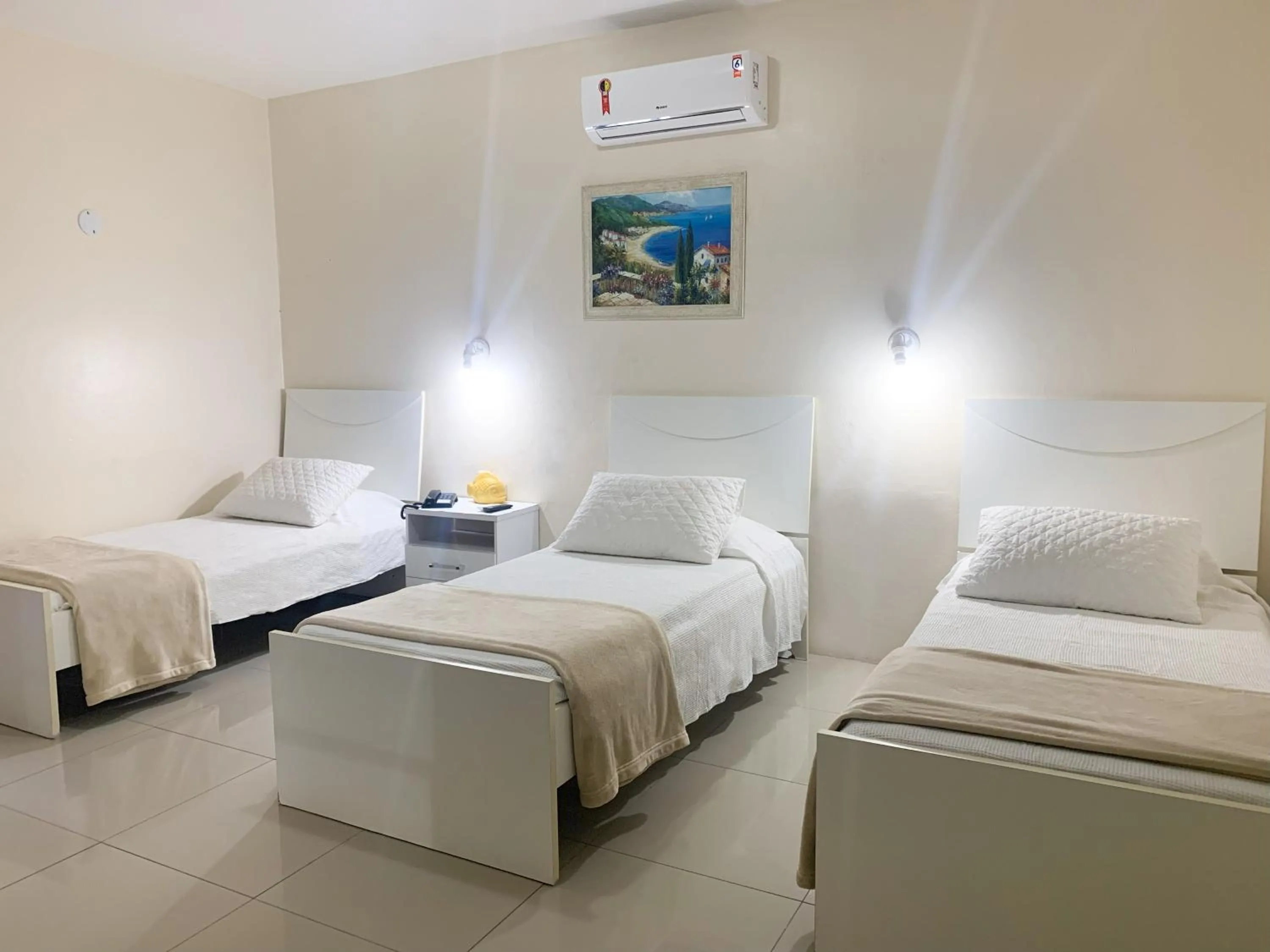 Bed in De Rose Palace Hotel