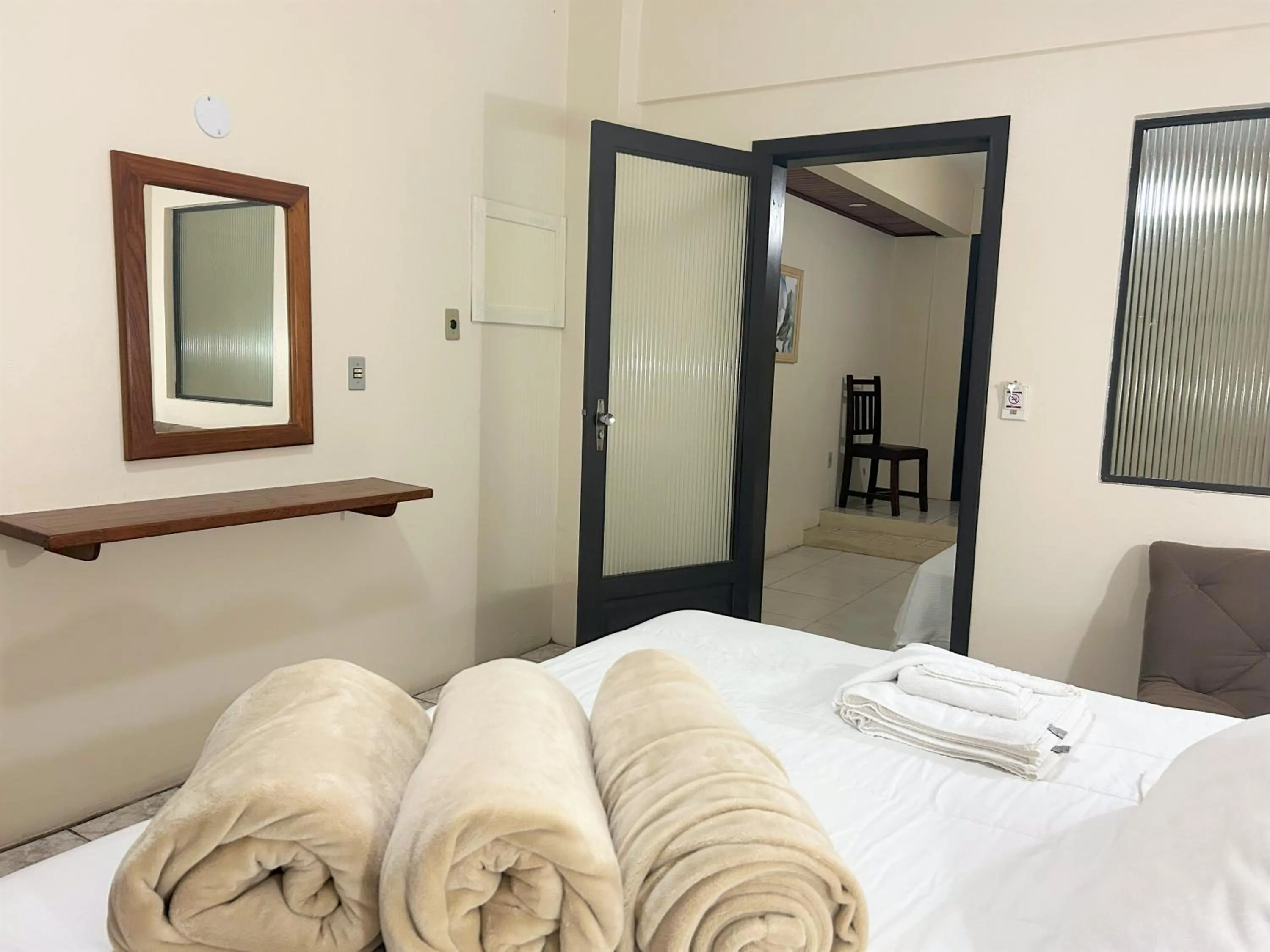 Bed in De Rose Palace Hotel