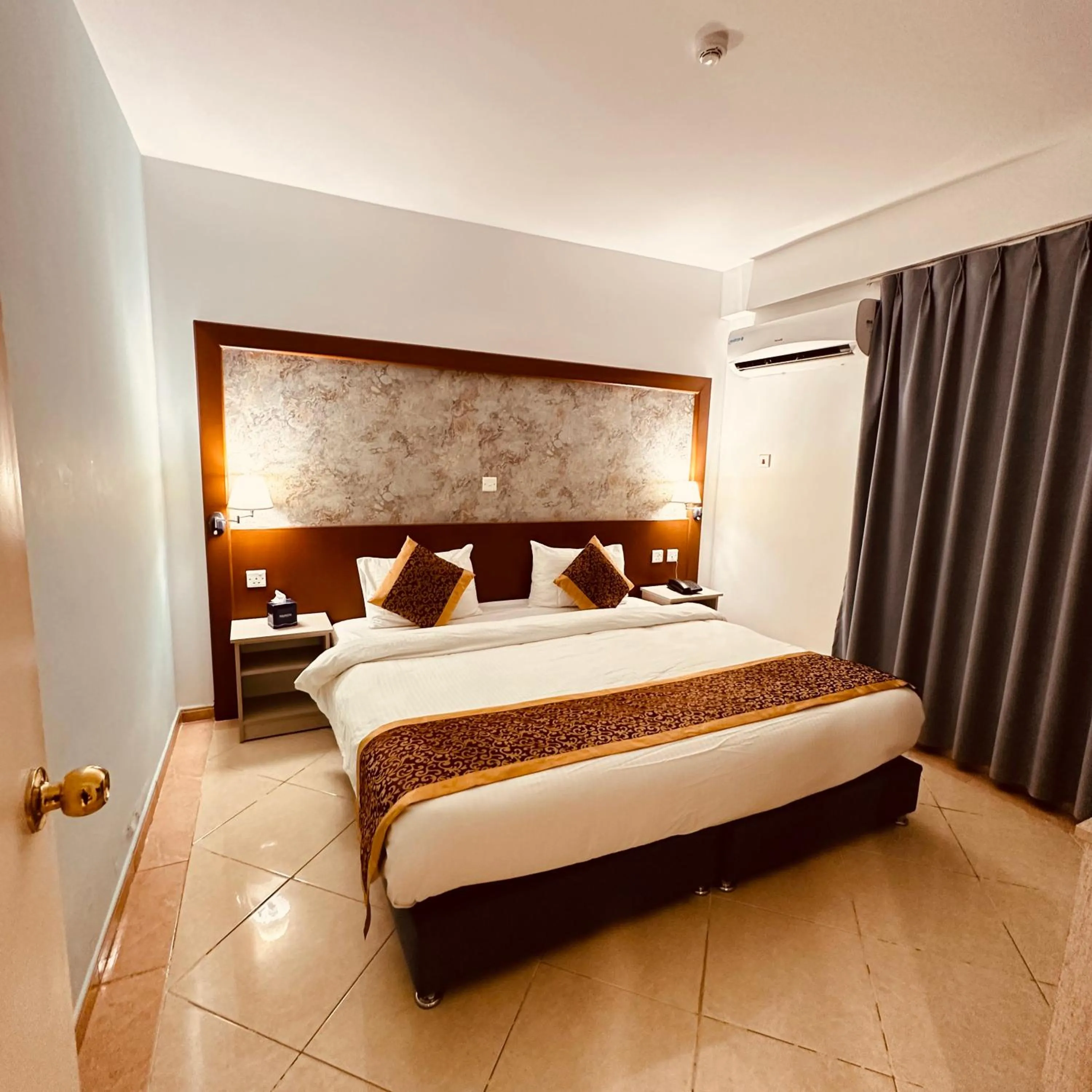 Photo of the whole room, Bed in Aquavista Hotel & Suites