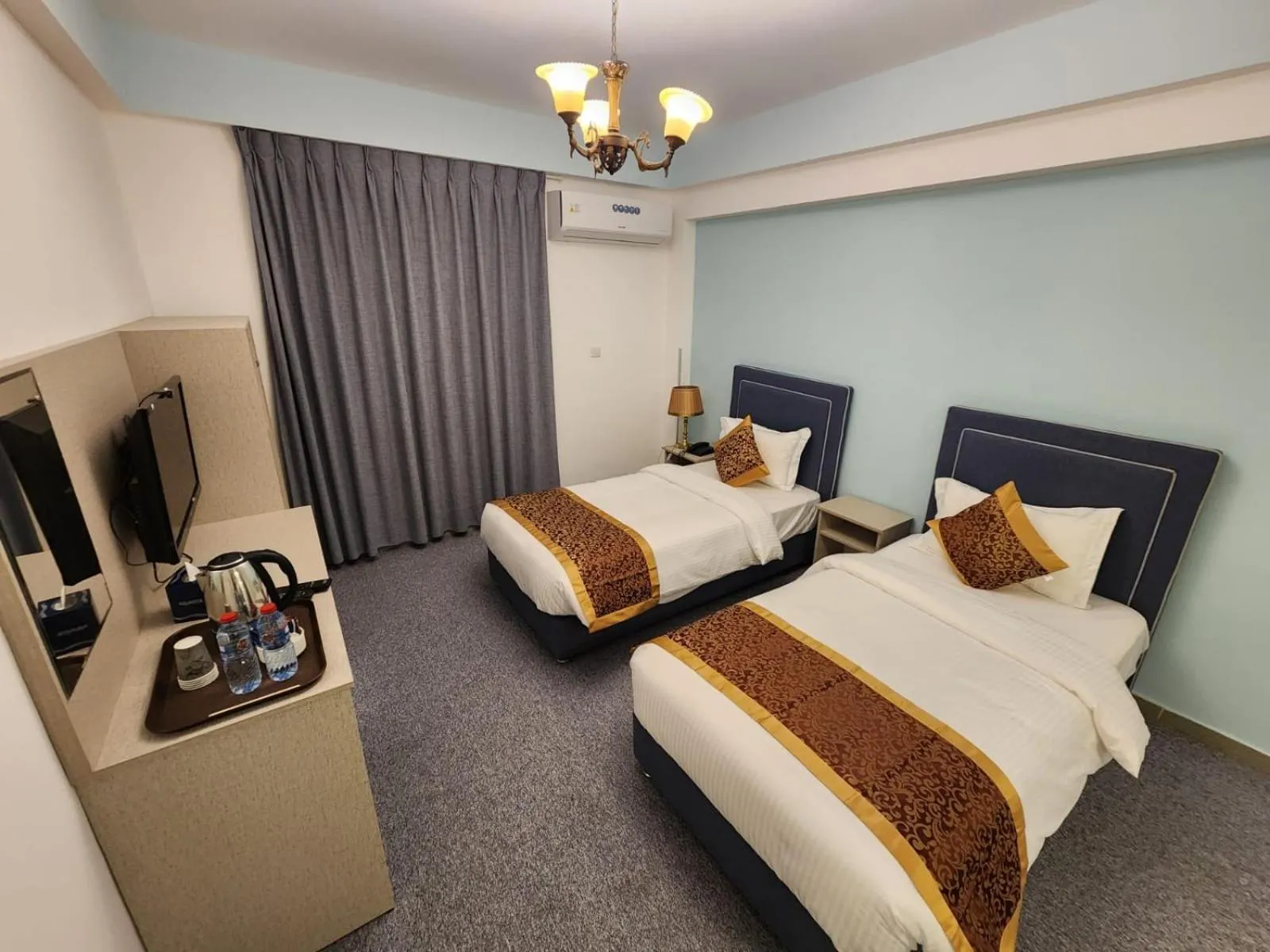 Bed in Aquavista Hotel & Suites