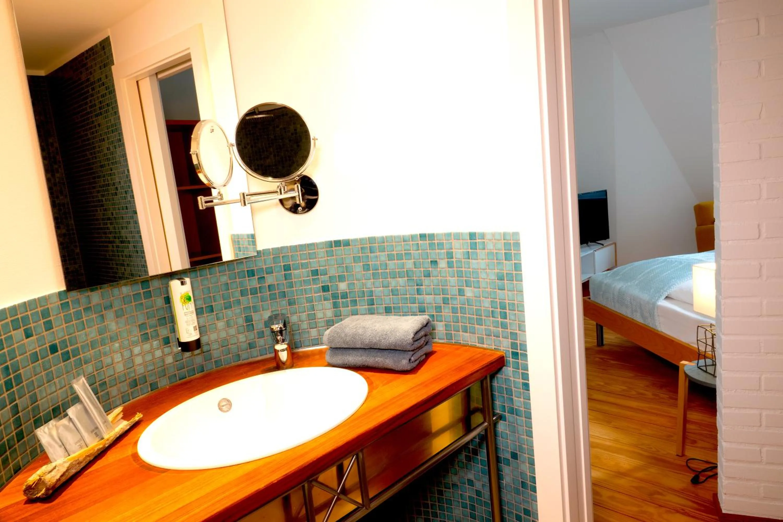Bathroom, Bed in Seehotel Villago