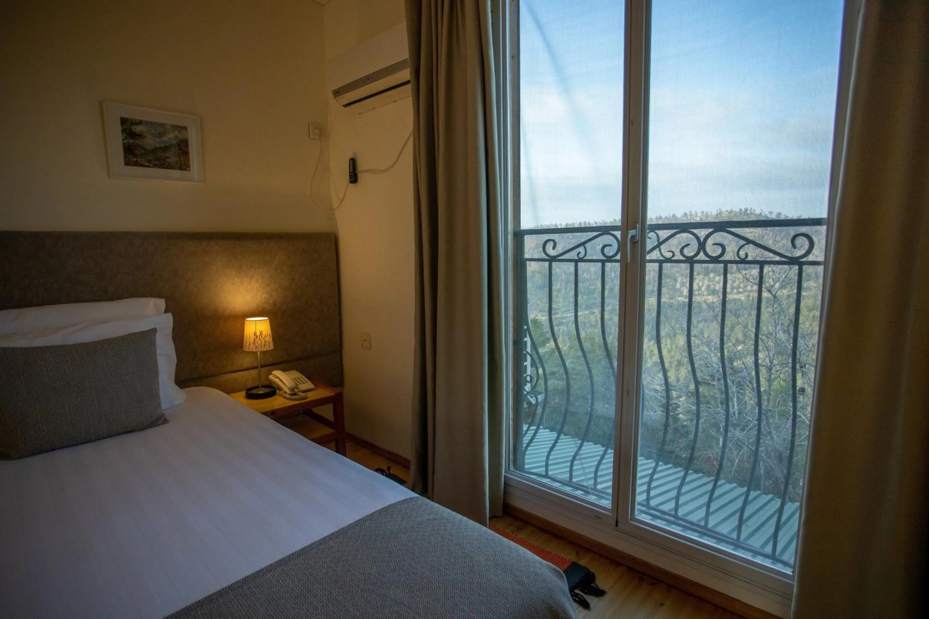 Bed in Logos hotel in Yad Hashmona