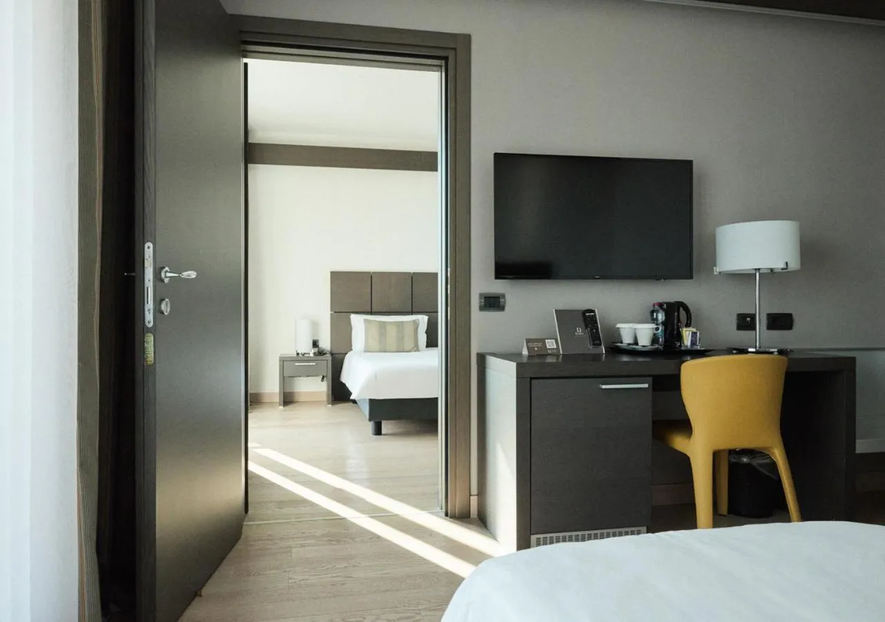 Photo of the whole room, Bed in Domina Milano Fiera