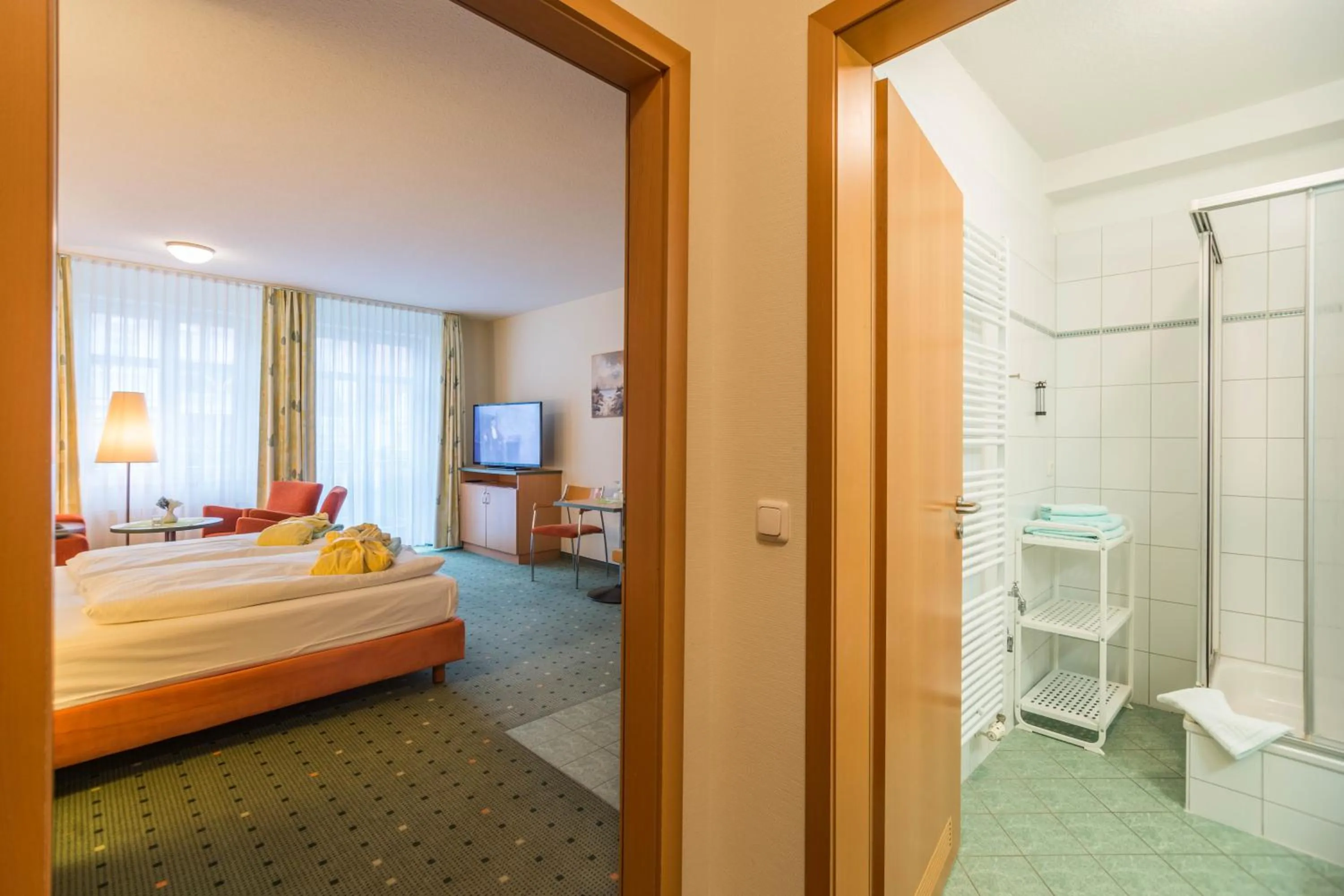 Photo of the whole room, Bed in Am Weststrand Aparthotel Kühlungsborn