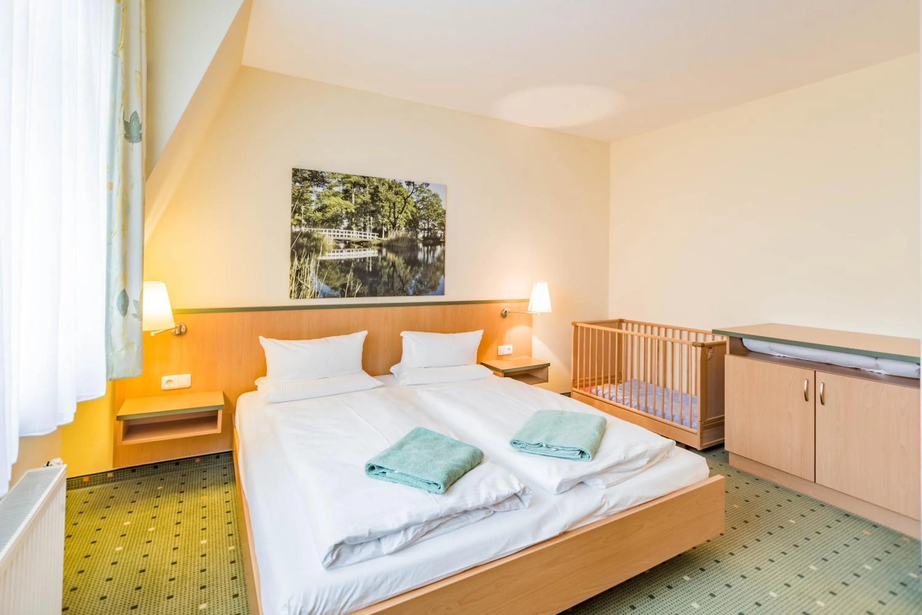 Photo of the whole room, Bed in Am Weststrand Aparthotel Kühlungsborn