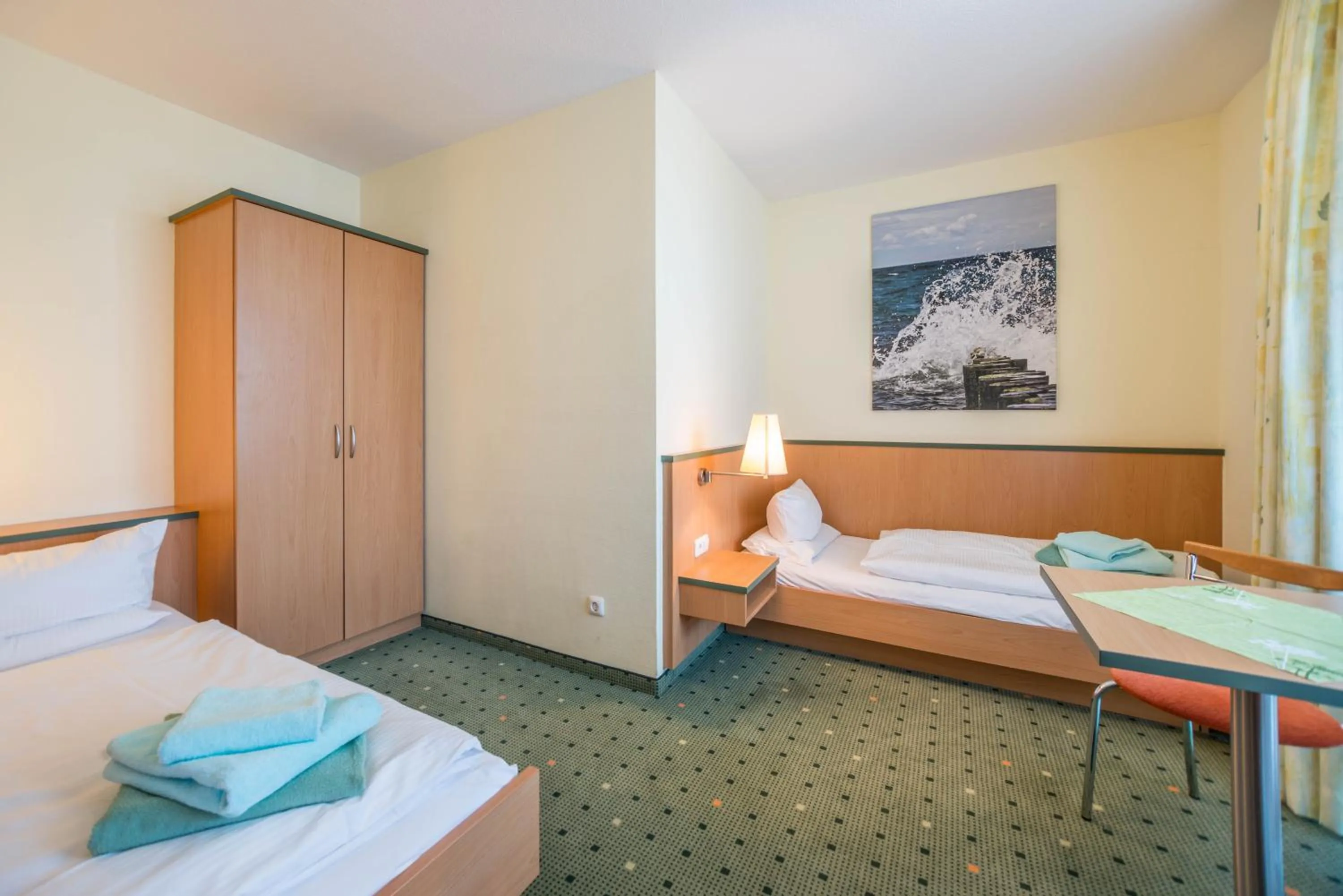 Photo of the whole room, Bed in Am Weststrand Aparthotel Kühlungsborn