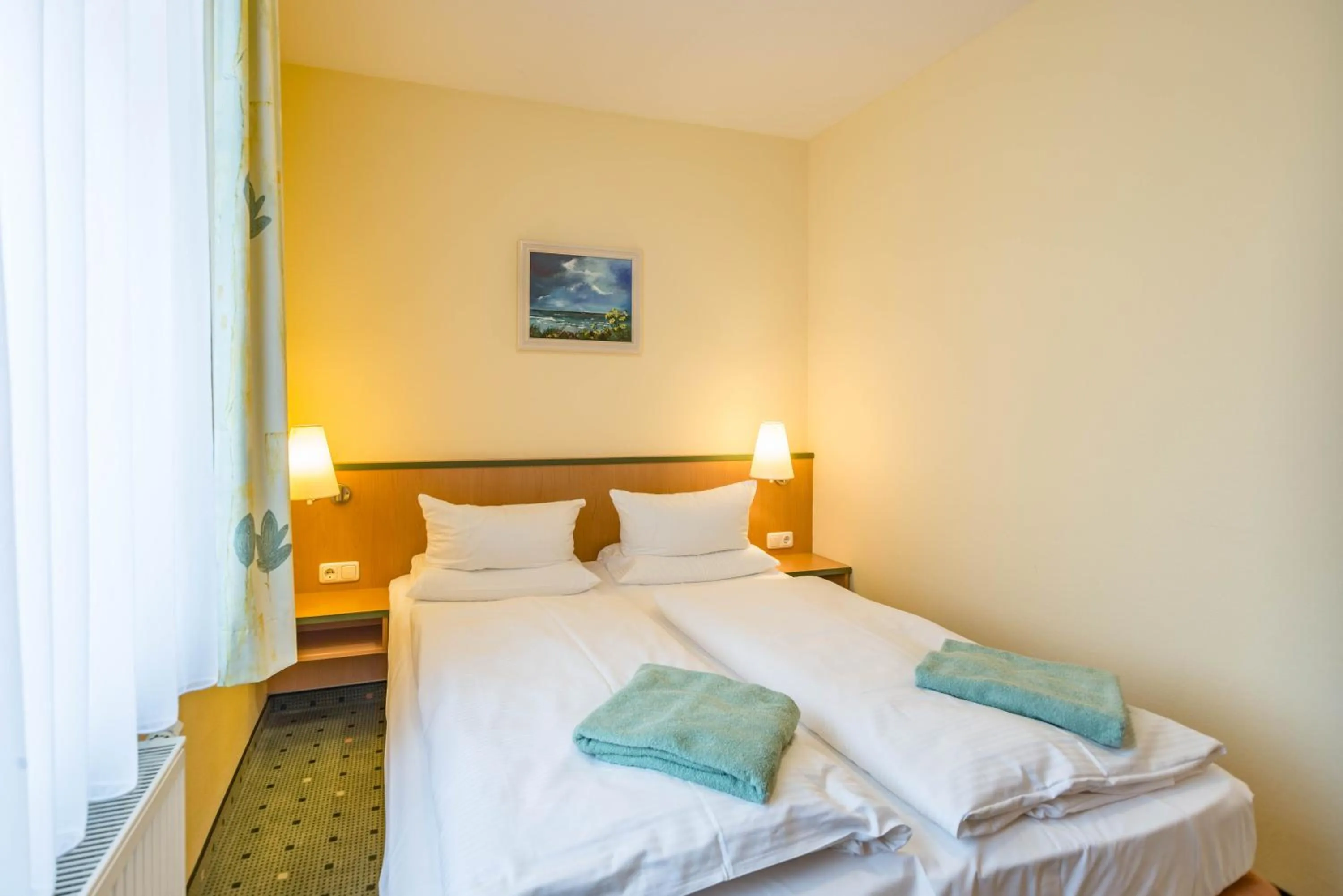 Photo of the whole room, Bed in Am Weststrand Aparthotel Kühlungsborn