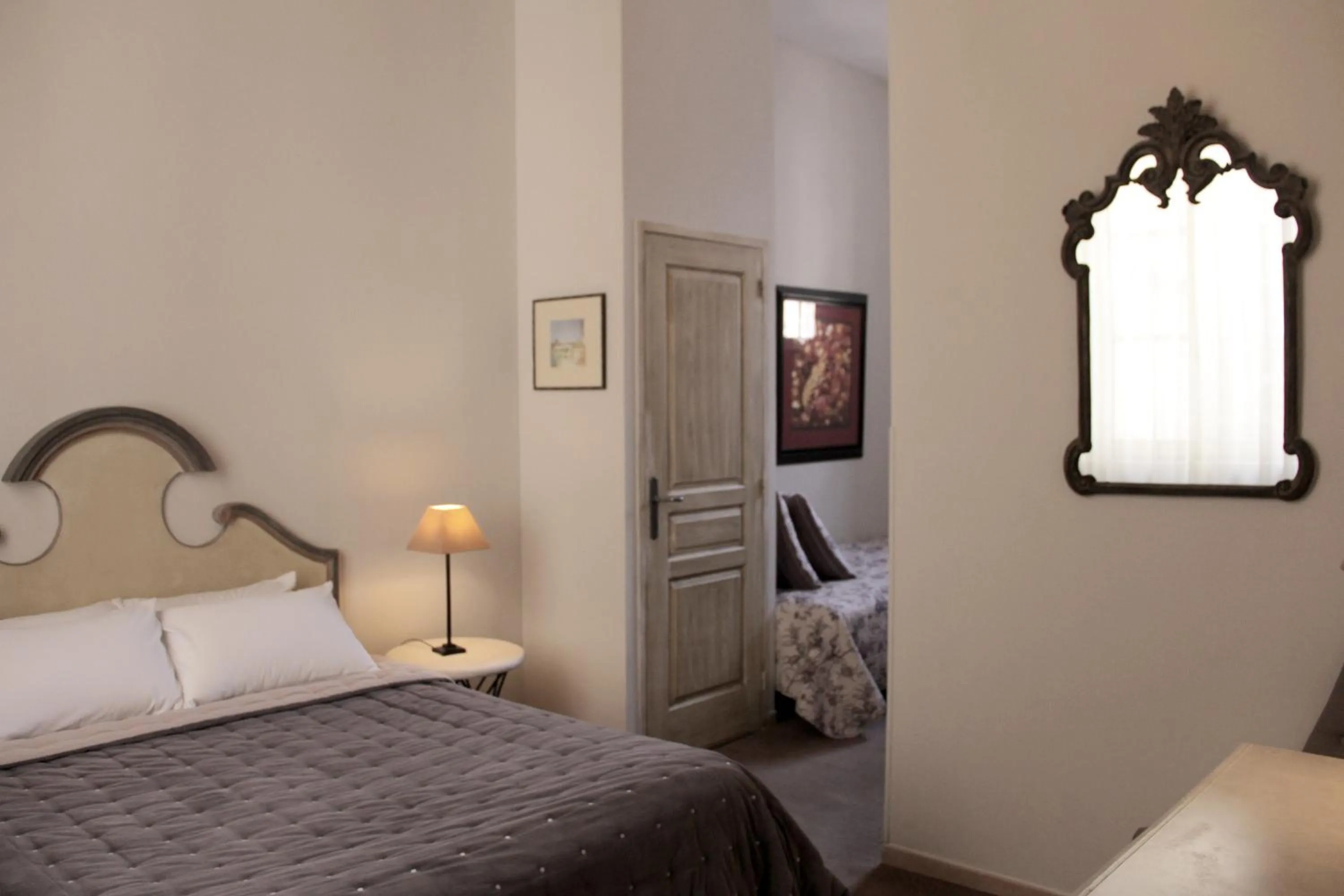 Photo of the whole room, Bed in Hôtel Amphithéâtre