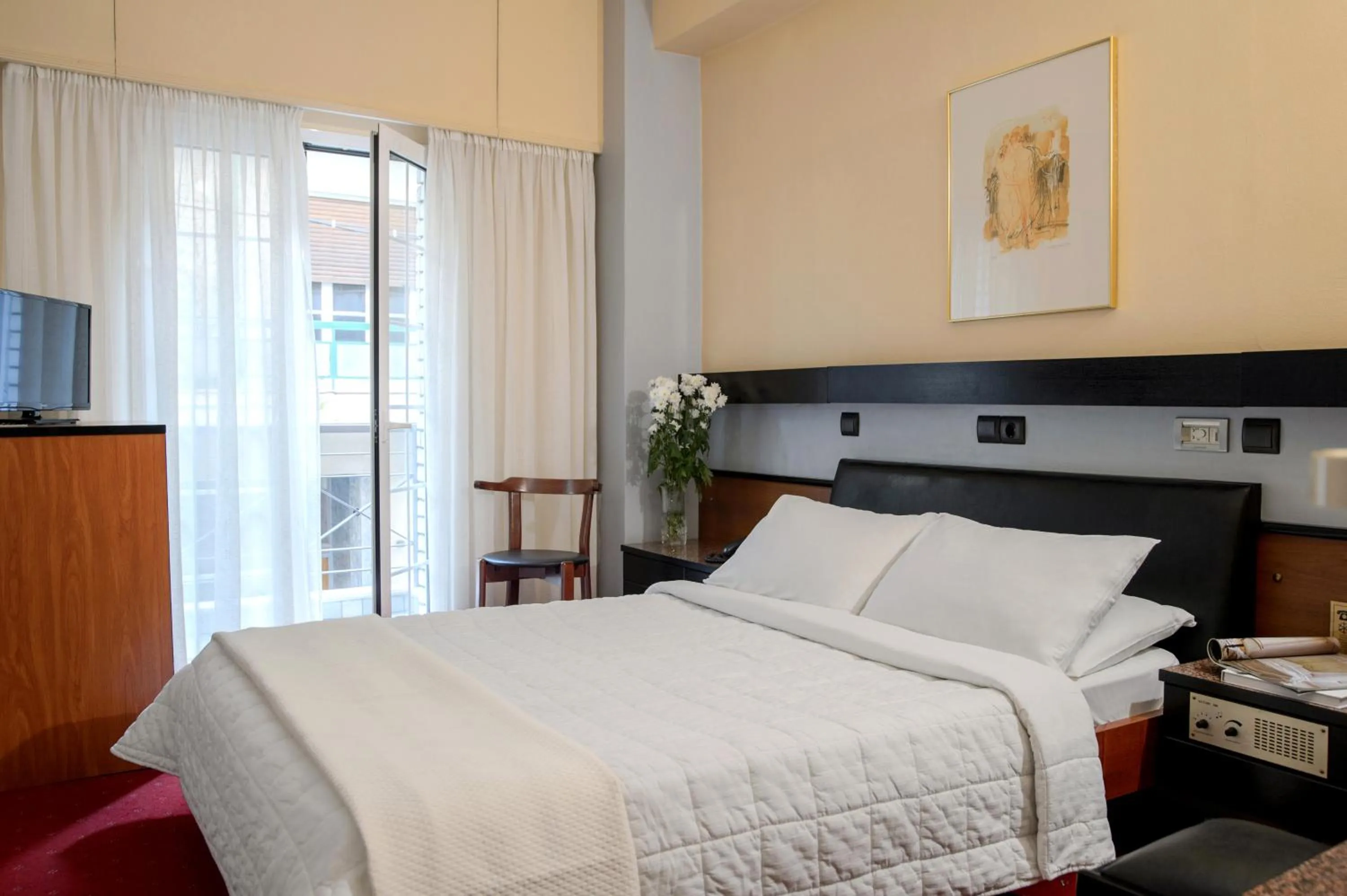 Bed in Victory Inn Hotel