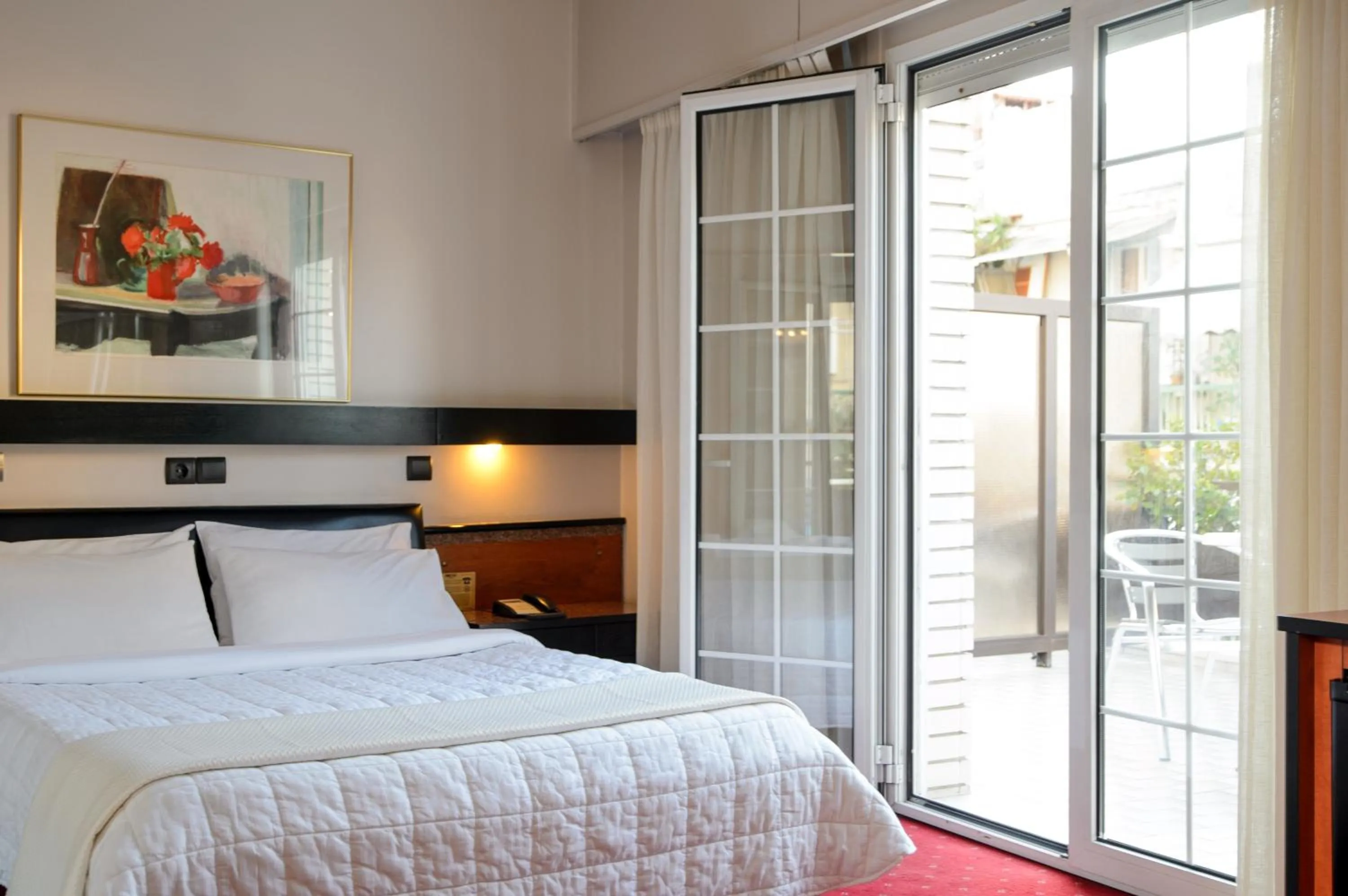 Bed in Victory Inn Hotel