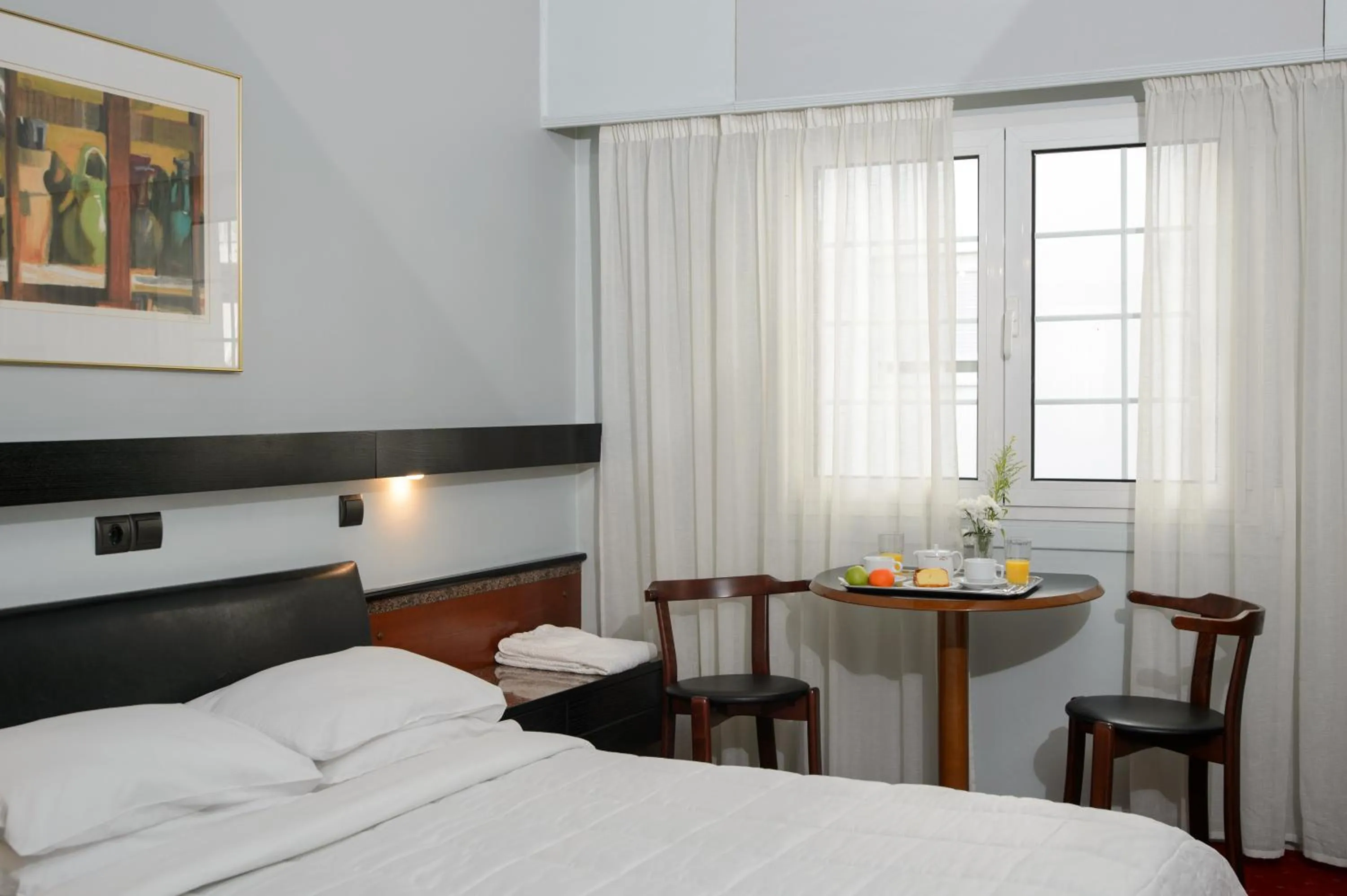 Bed in Victory Inn Hotel