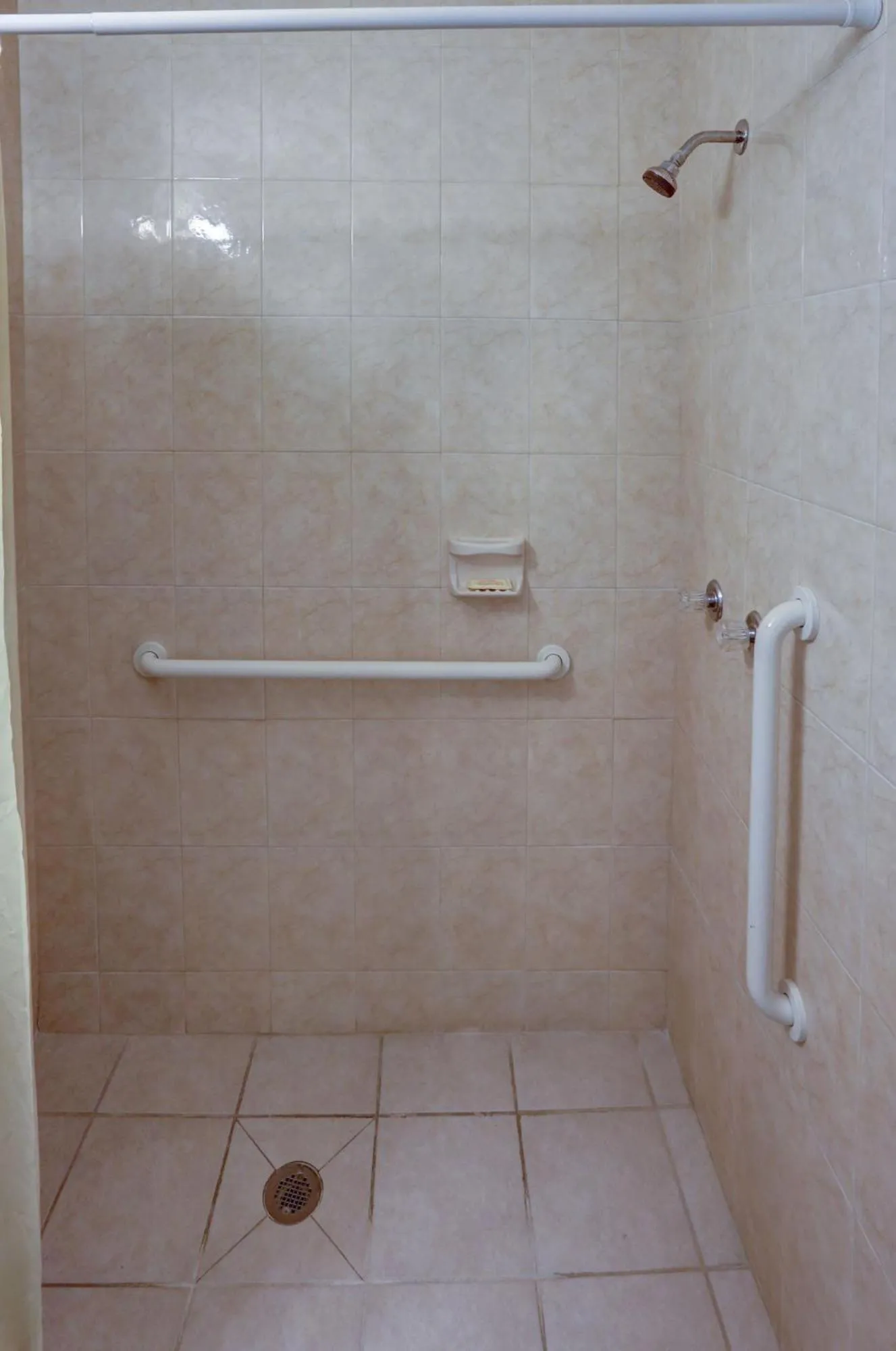 Shower in Richard's Motel Courtyard