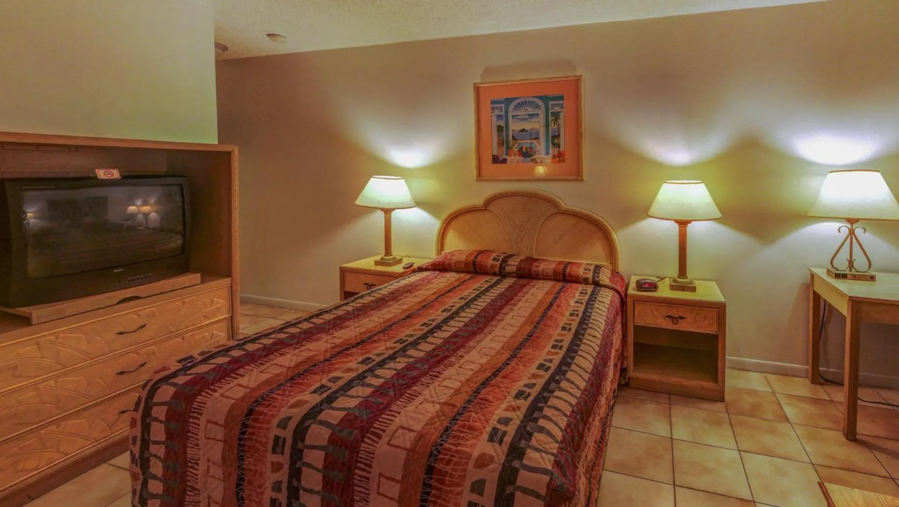 Bed in Richard's Motel Studios