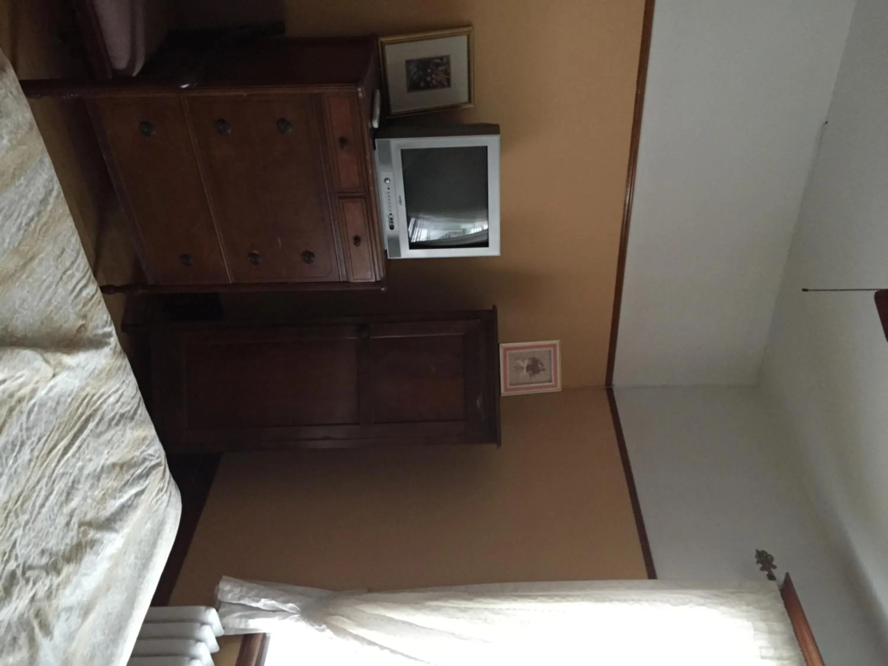 Bedroom in Le Petit Château Montebello B&B