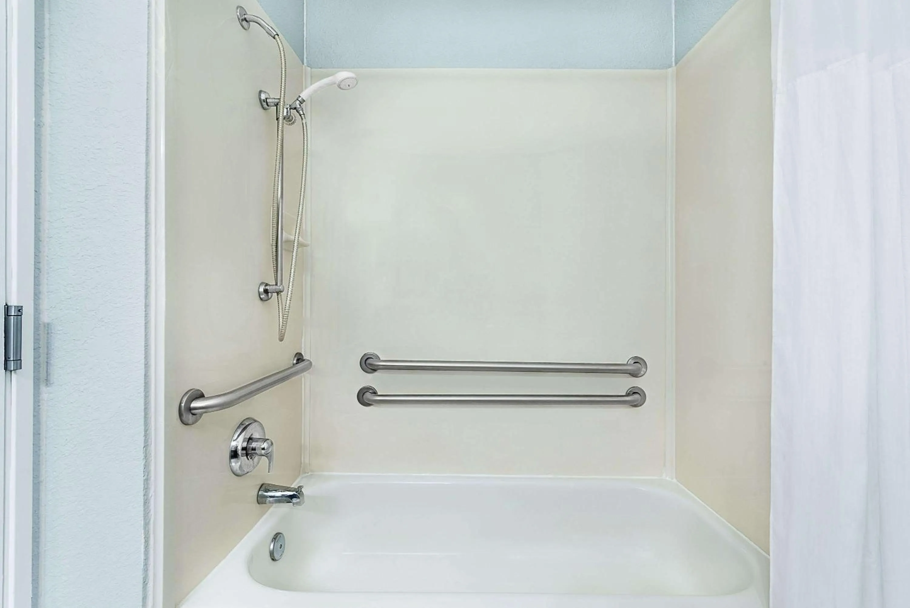 Bathroom in Days Inn & Suites by Wyndham Dallas