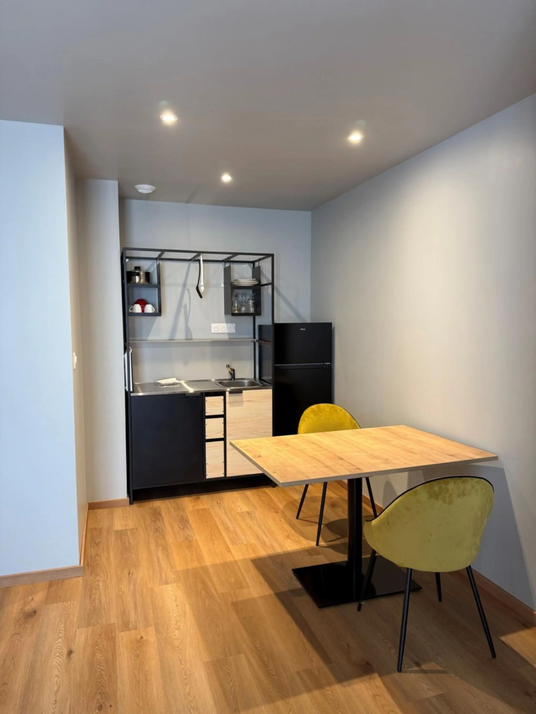 Kitchen or kitchenette in Tulip Inn Honfleur Residence & Spa