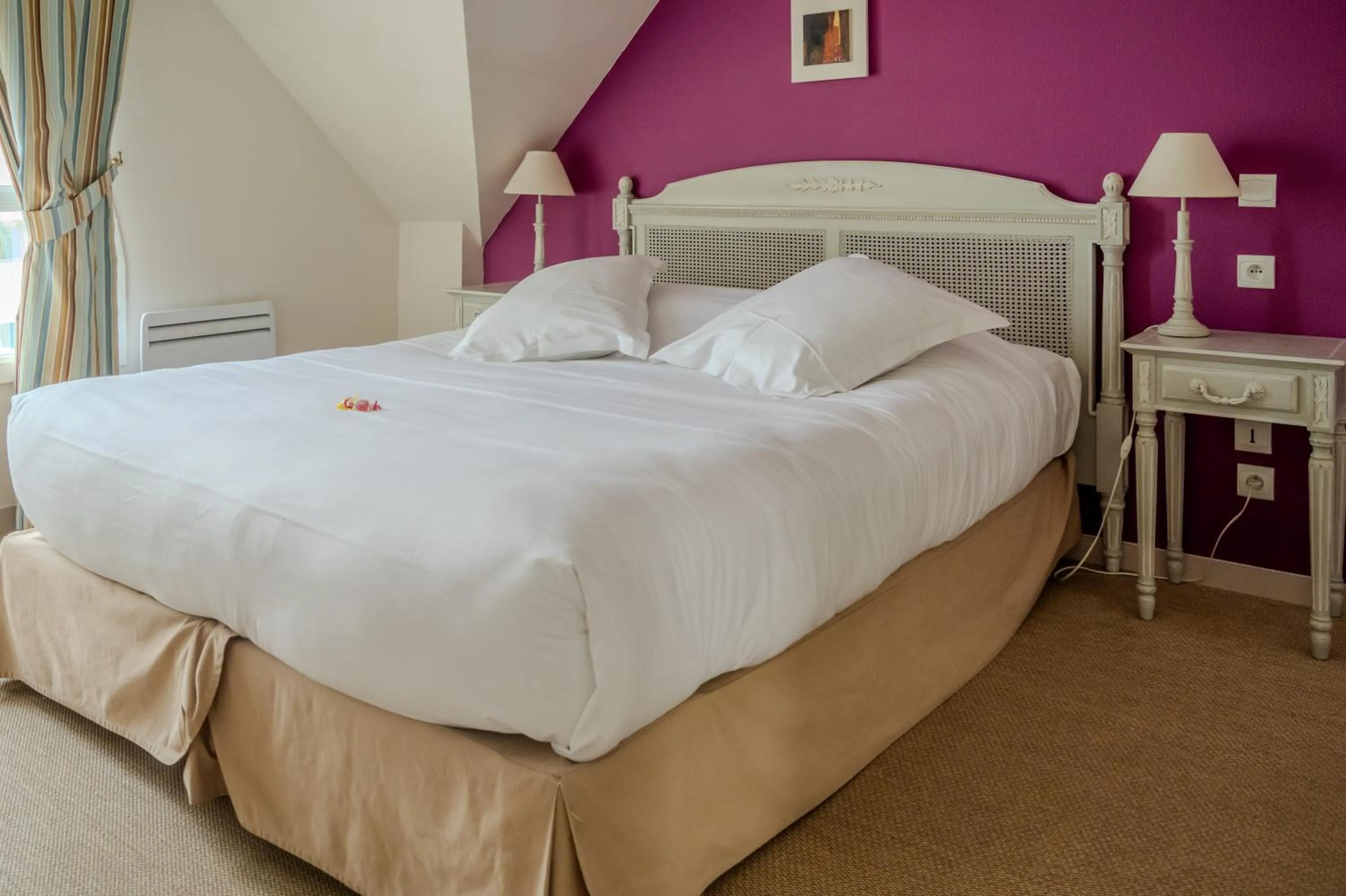 Bed in Tulip Inn Honfleur Residence & Spa