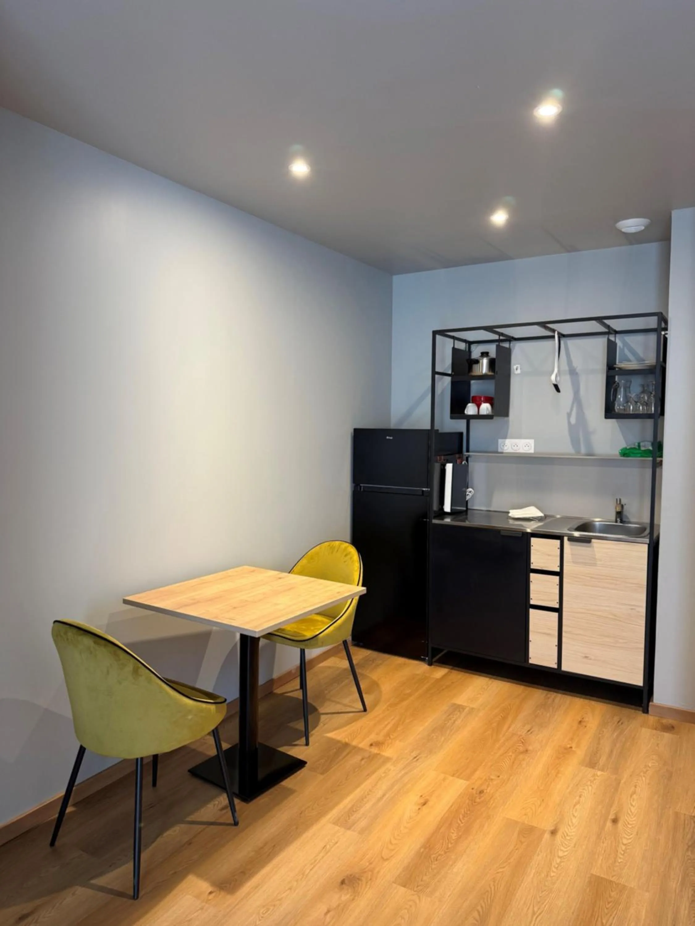 Kitchen or kitchenette in Tulip Inn Honfleur Residence & Spa