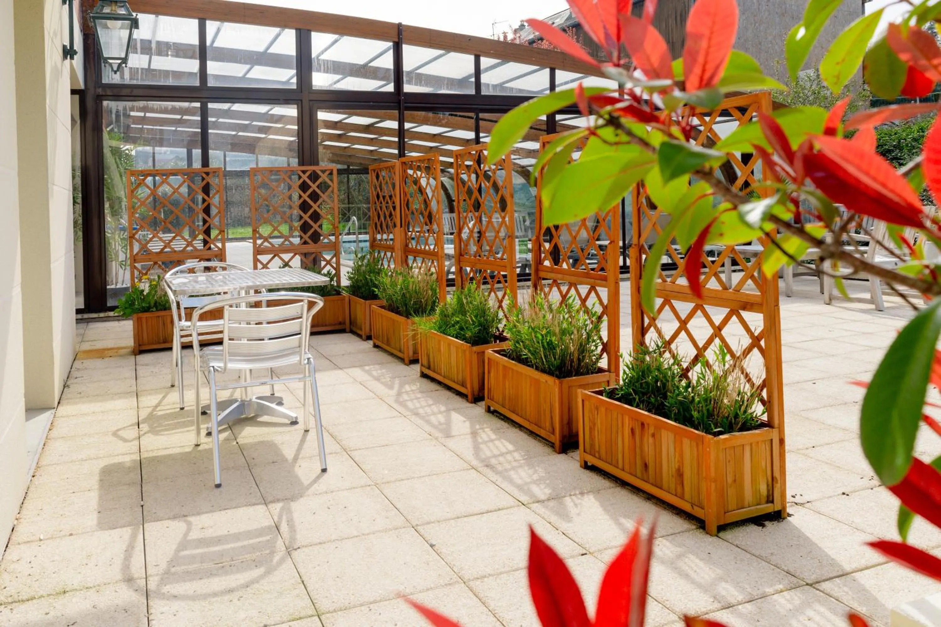 Patio in Tulip Inn Honfleur Residence & Spa
