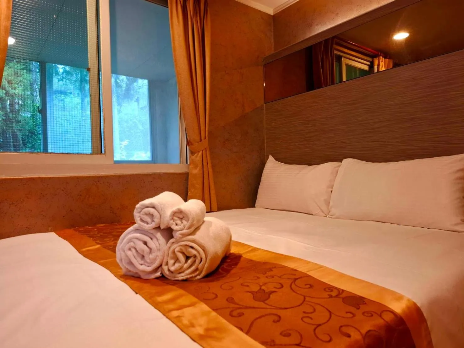 Bed in Gau Shan Ching Hotel
