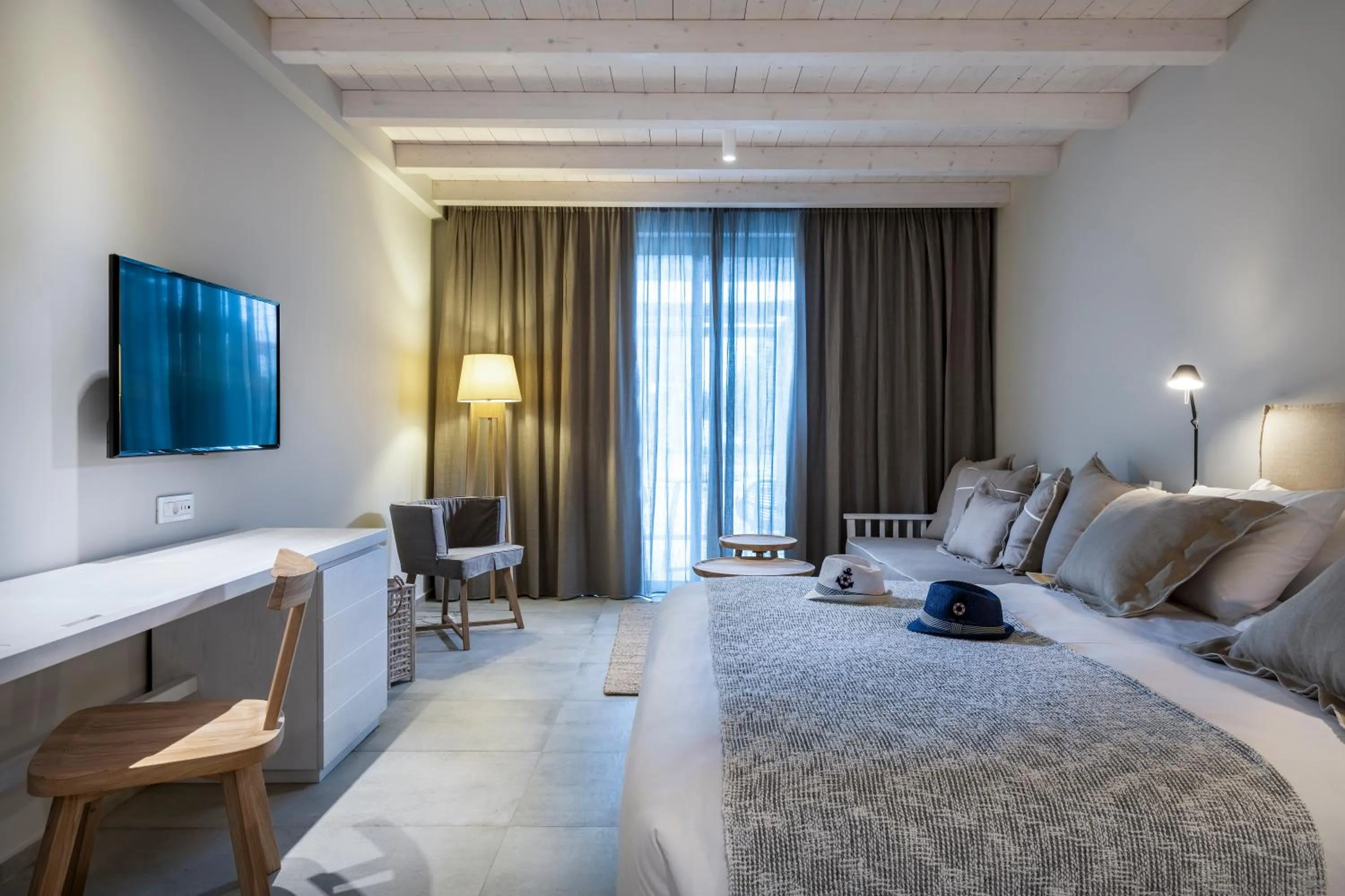 Bed in Caravia Beach Hotel