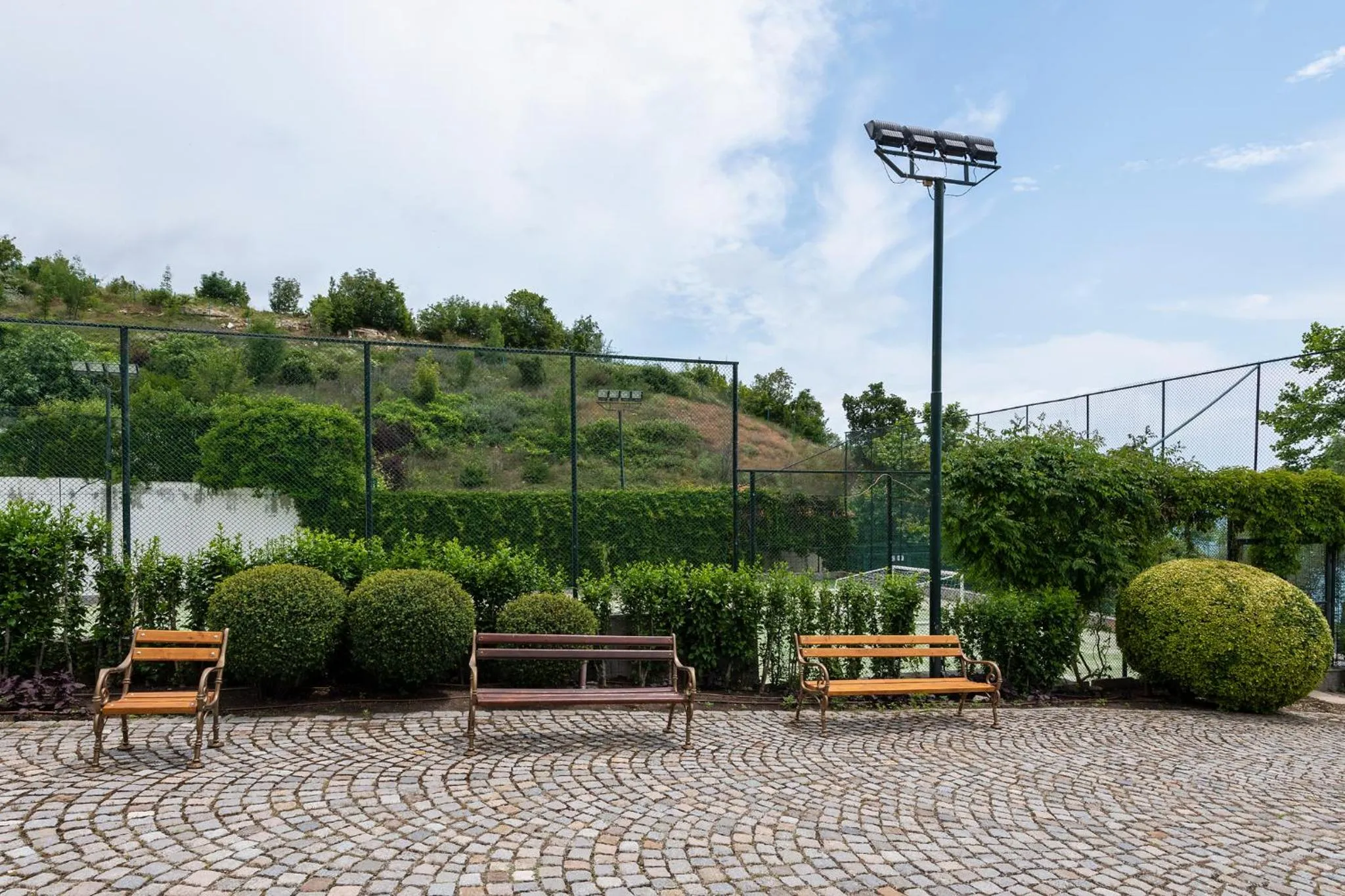 Tennis court in Garden of Eden Complex