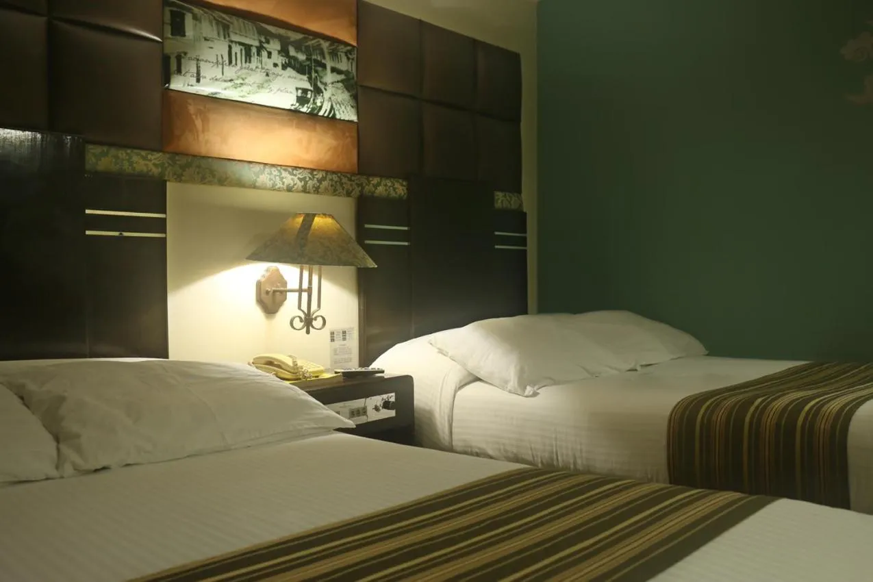 Bed in The Bellavista Hotel