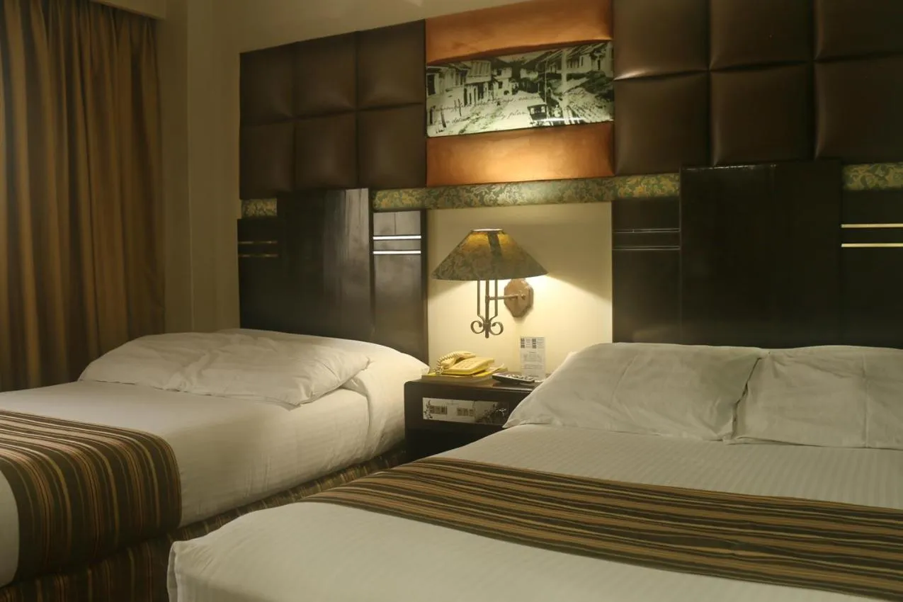 Bed in The Bellavista Hotel