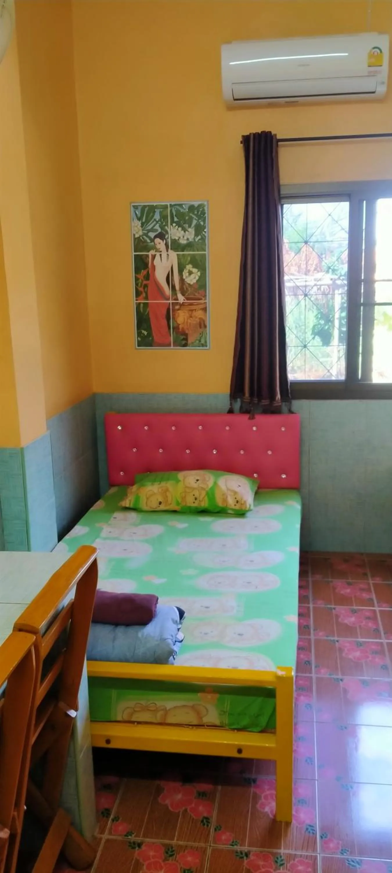 Bed in RuengsriSiri Guesthouse