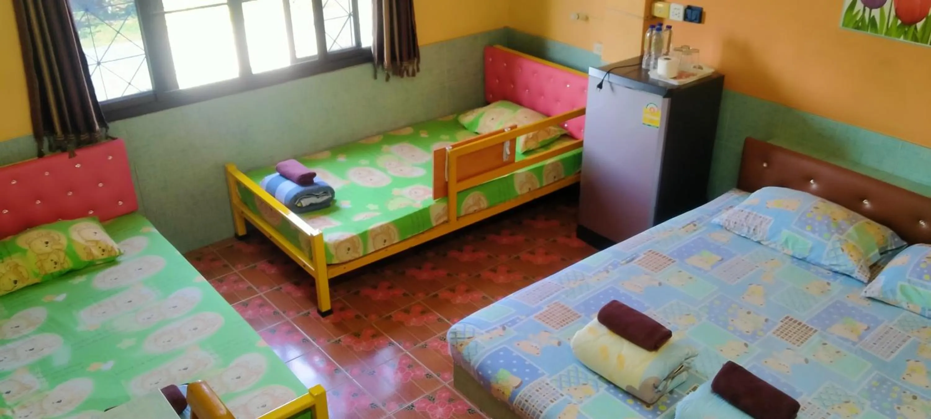 Bed in RuengsriSiri Guesthouse