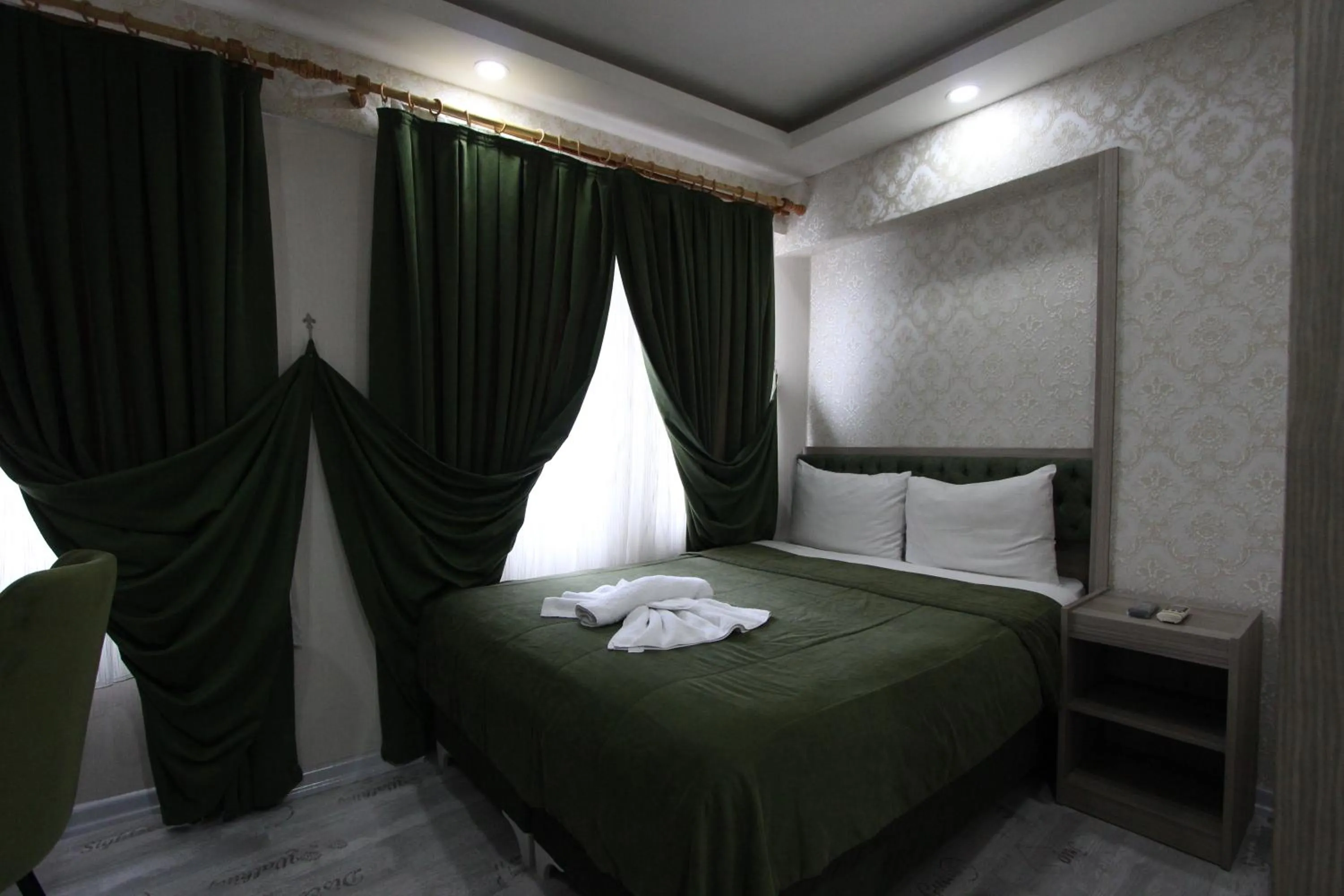 Bed in Kaya Madrid Hotel