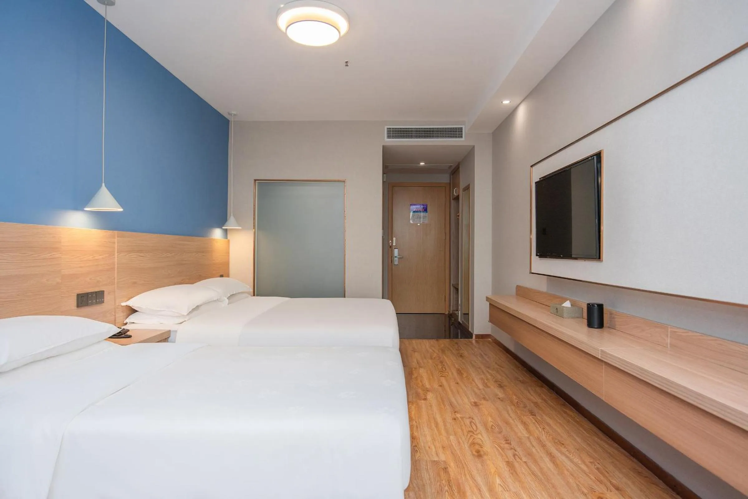 Bed in Future Shangju Hotel